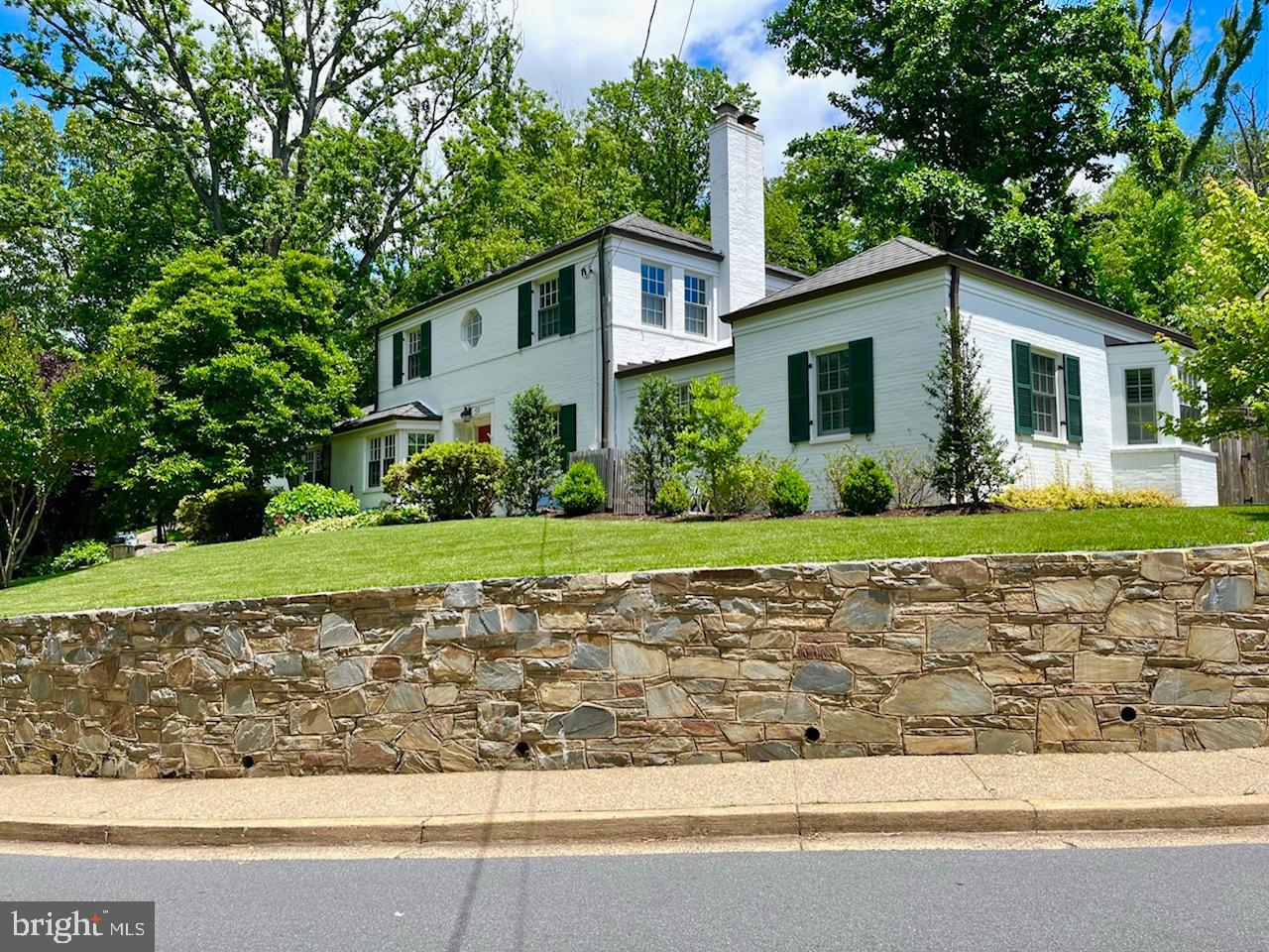 Welcome to this stately and beautifully maintained 5 BR/4.5 BA expanded colonial in Donaldson Run.  4259 Vacation Lane is truly a unique property, that blends charm and character with expertly reimagined and enlarged modern renovations that make it a joy to call home.  Four bedrooms, including a main level primary suite, means that the home can accommodate a variety of life stages - whether you are looking to age in place or extended family has come to stay, you can do it here.  The primary suite addition features luxurious built-in shelving, and a large, light and bright sitting area/den that is perfect as a home office.  The spacious primary bedroom, with vaulted ceilings, expansive walk-in closet and private access to the serene backyard garden is your personal oasis.  One of the prettiest areas of the primary suite is the stylishly appointed bathroom - the best way to describe it is “classy spa vibes.”   You’ll enjoy heated slate floors, an elegant freestanding soaking tub, and a marble shower with dual heads. 

 

The main level also features the heart of this home - an expanded and updated kitchen that feels airy and is brimming with natural light, thanks to its vaulted ceilings and abundant windows.  The kitchen's layout is open-plan, designed for both functionality and style and boasts stainless steel appliances, table space, built-in shelving and a sitting area. Adjacent to the kitchen is a convenient main level laundry room, with a custom built-in hall tree to keep your "drop zone" organized.  From the kitchen, step into the peaceful rear yard that looks like something straight out of a fairytale, complete with flagstone patio, retaining wall, abundant blooms, mature plantings and a privacy fence. 

 

Going downstairs, step into a basement that has been carefully designed to offer both comfort and versatility. It features a recreation room, a renovated full bathroom, wine cellar and an oversized fully finished flex space with legal egress that is suited for almost any purpose under the sun - home office, large bedroom, home gym, the possibilities are endless.   Best of all is the prime location - just half a mile to Lee Heights shopping center, a quarter mile to Hamm Middle School and Taylor Elementary, and minutes to Ballston, Clarendon, Rosslyn, I-66, and the GW Parkway.