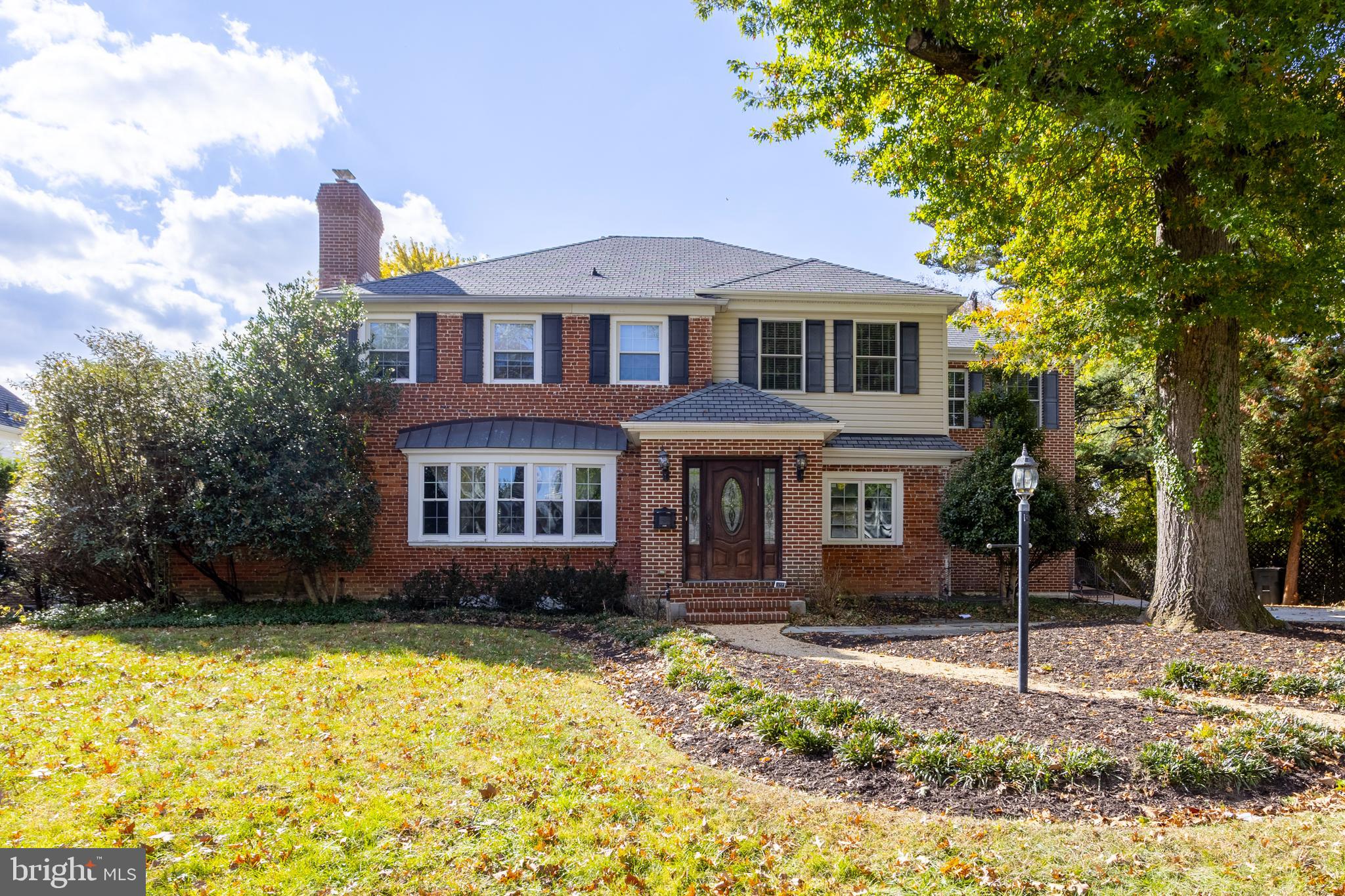 This fabulous 6-bedroom, 5.5-bathroom colonial is a true gem in the heart of Fallstaff! The spacious main level is perfect for both everyday living and entertaining, featuring a cozy living room with a fireplace, a formal dining room, and a gourmet kitchen with a breakfast area that flows into the adjacent family room. A private study and a bedroom with an en-suite bath offer added convenience and flexibility. Upstairs, the luxurious master suite is a true retreat, complete with a tray ceiling, dual walk-in closets, a spa-like bath, and sliders leading to a private terrace. Four additional bedrooms, two full bathrooms, and a laundry area provide ample space for the whole family. The  finished lower level offers even more living space with a second kitchen, a spacious rec room, and a full bath—ideal for guests or entertaining. Outside, the beautifully landscaped yard includes a deck, stone patio, and a shed for extra storage.