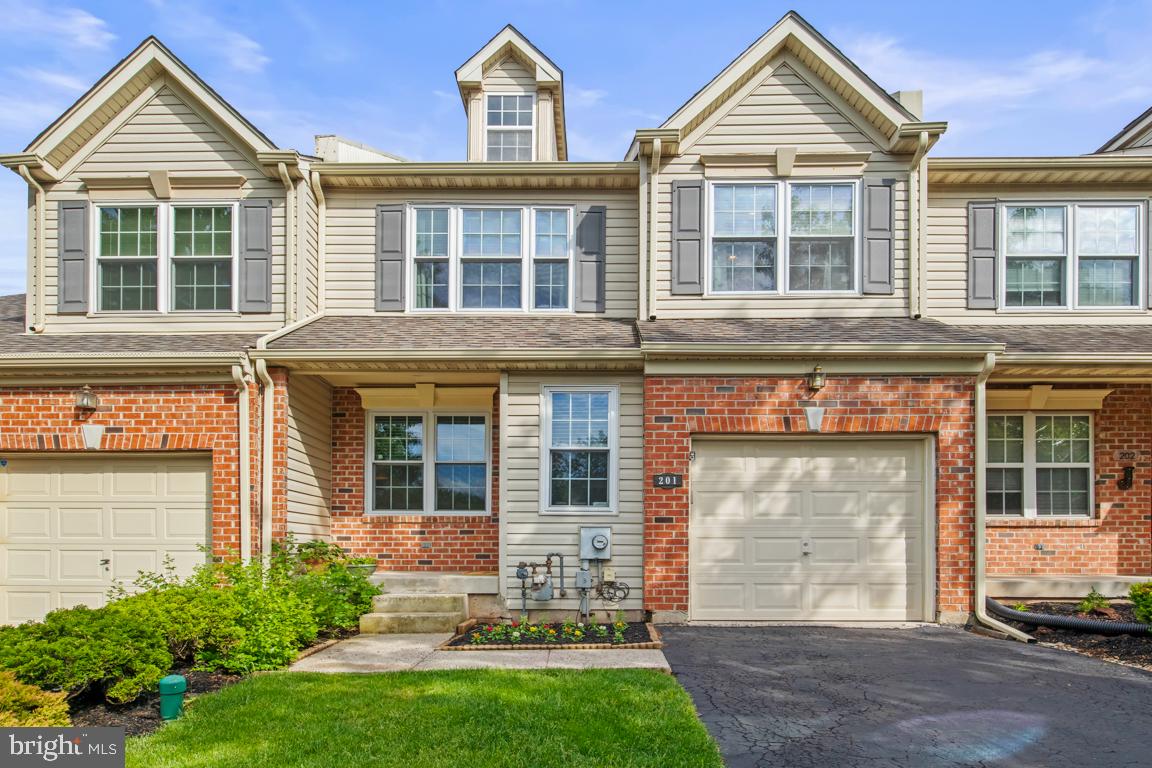 Nestled in the charming Williamsburg Village community, this exquisite Colonial townhouse offers a harmonious blend of elegance and comfort, perfect for those seeking a refined lifestyle. Built in 1999, this meticulously maintained residence spans 1,924 square feet, showcasing a thoughtful design that caters to both relaxation and entertaining. As you step inside, you are greeted by a warm and inviting atmosphere, accentuated by the cozy gas fireplace that serves as the heart of the living space. Natural light pours in through well-placed windows, enhancing the home's welcoming ambiance. The gourmet kitchen is a culinary enthusiast's dream, featuring modern appliances and ample counter space, making meal preparation a delight. Whether you're hosting a dinner party or enjoying a quiet evening at home, this kitchen is designed to inspire creativity and connection. This residence boasts three generously sized bedrooms, providing ample space for relaxation and personalization. The primary suite is a true retreat, complete with an en-suite bathroom that offers both privacy and luxury. With two full bathrooms and an additional half bath, convenience is at your fingertips. Venture downstairs to discover a fully finished basement, offering endless possibilities for a home office, entertainment area, or personal gym. This versatile space enhances the home's functionality, catering to your unique lifestyle needs. Outside, the property features an attached garage with a front entry, ensuring easy access and additional storage options. The low-maintenance yard allows you to spend more time enjoying the community and less time on upkeep. Located in a vibrant neighborhood, this townhouse is just moments away from local amenities, parks, and dining options, providing a perfect balance of tranquility and accessibility. Experience the luxury of living in Williamsburg Village, where every detail has been thoughtfully curated to create a sanctuary you will be proud to call home. Embrace a lifestyle of comfort, elegance, and community in this stunning property.