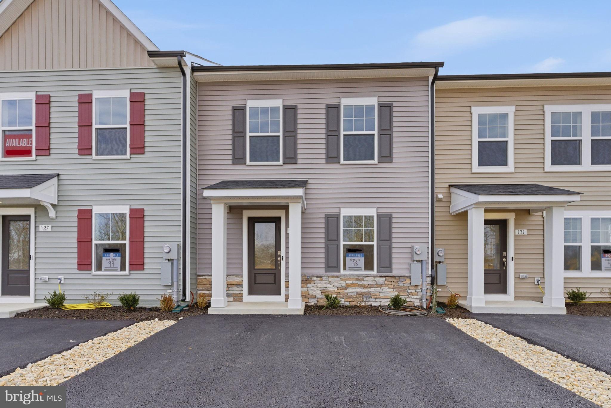 *OFFERING UP TO $15,000 IN CLOSING  COST ASSISTANCE FOR PRIMARY RESIDENCE WITH USE OF APPROVED LENDER AND TITLE.*
An incredible opportunity in the brand-new Villages at Courthouse Square! This beautifully upgraded 3-bedroom, 2.5-bath townhome in the second building of the community offers modern style, everyday functionality, and unbeatable value. From the moment you arrive, the attractive stone water table on the front exterior adds curb appeal and a high-end touch that sets this home apart. Inside, you’ll love the sleek gray cabinetry, silver finishes, stunning backsplash, and extended kitchen island that’s perfect for hosting or casual nights in. The morning room extension adds the extra living space buyers crave, bringing in abundant natural light and creating an open, inviting layout. Outside, enjoy a rare 2-car wide driveway plus an attached rear exterior shed for the additional storage space everyone needs. Even better, this homesite offers a convenient, easy walk to your mailbox, adding simple day-to-day convenience to your lifestyle. Located in a community that is naturally amenitized within the surrounding area, you’ll enjoy nearby conveniences, local attractions, and everyday essentials just minutes away! Great price. Strong incentives. Prime location within the community. Designer finishes throughout.