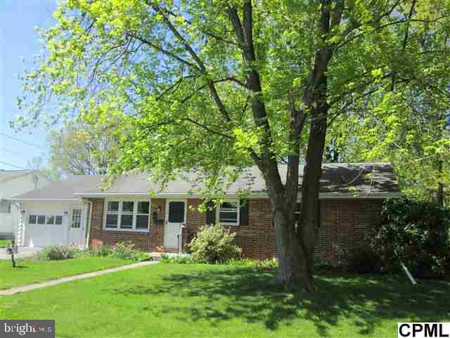 Easy one floor lifestyle!  Nice Ranch home - perfect for downsizing or just beginning home ownership.  Wood floors throughout, bright Kitchen w/all appliances included, plus washer/dryer and freezer on lower level.  Newer windows, great backyard for gardening, entertaining or just relaxing. Home has central air, attached garage and a full basement.
