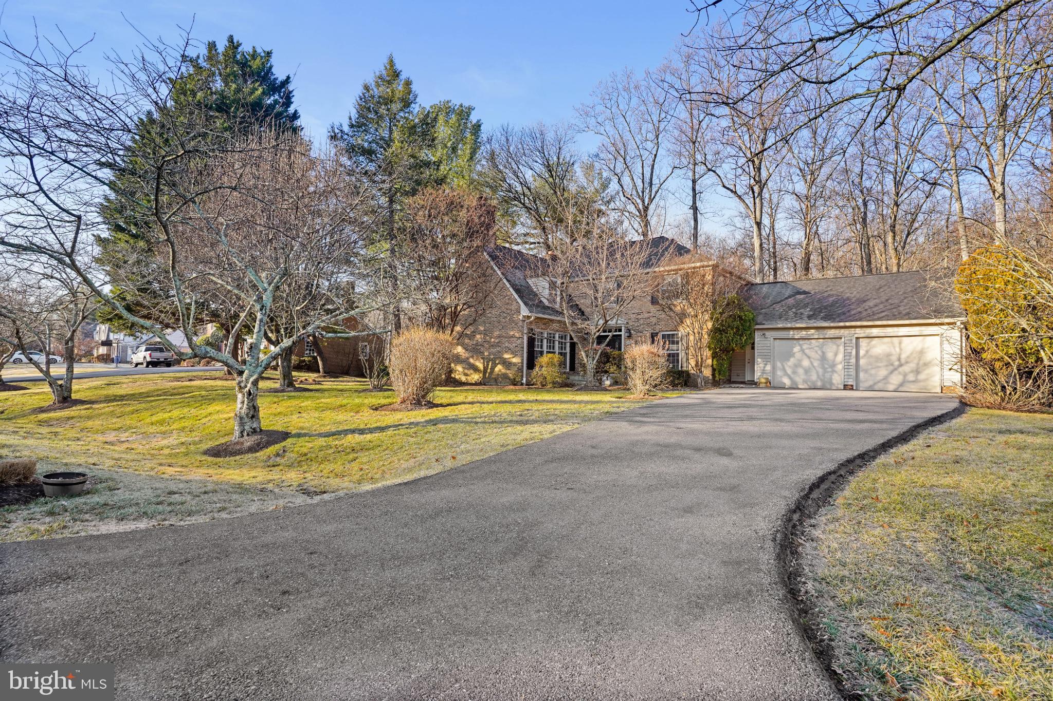 Just steps from the charm and convenience of Potomac Village, this exceptional residence offers timeless elegance, generous living spaces, and a truly enviable location. The entrance flows seamlessly into a refined formal living and dining rooms, a private study, and a beautiful kitchen. The kitchen features a sun-drenched breakfast area and large size windows that overlook lovely, professionally landscaped grounds, and a picturesque patio garden below.

The inviting family room, anchored by a striking stone fireplace, is ideal for relaxed evenings at home, while the expansive deck creates the perfect setting for outdoor entertaining and memorable gatherings. The main level is thoughtfully designed with a spacious laundry/mudroom,  powder room, and abundant storage throughout.

Upstairs, newly refinished hardwood floors and staircase lead to five generously sized bedrooms, including an impressive Master Bedroom suite with a large walk-in closet and gorgeous master bathroom. Four additional bedrooms with ample closet space and two full bathrooms complete the upper level.

The walk-out lower level offers exceptional versatility, with a recreation room complete with a custom bar, an additional bedroom and full bathroom, a bonus/flex room ideal to repurpose as a gym or office, and multiple storage areas. An attached two-car garage adds everyday convenience.

Located within walking distance from Potomac Village’s shops, dining, library, post office, and public transportation to Friendship Heights Metro, this home delivers the perfect blend of elegance, comfort, and convenience—nestled on a quiet street yet minutes from it all.