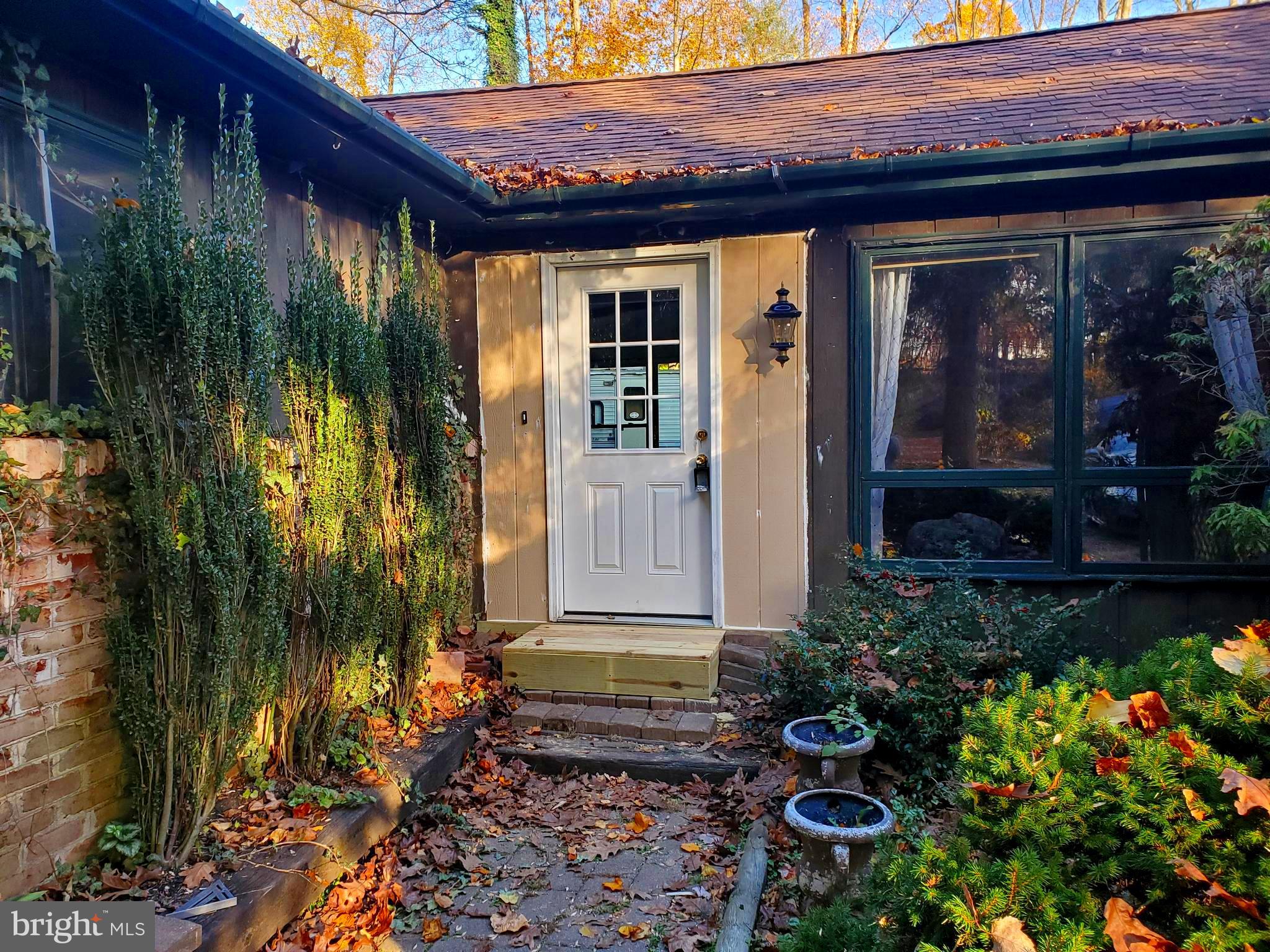 Walk right in to this 3 bedroom, 1.5 bath ranch located in Southern Lehigh SD, on almost 3 acres! This beautiful wooded setting and quite road is a rare find. This home needs some TLC, but it will make someone a beautiful home! It contains an eat-in kitchen, dining room and living room with a vaulted ceiling with exposed beams, fireplace and brand new laminate flooring. The powered, detached 2 car garage is extra deep for storage. Seller will consider repairs and credits on a case by case basis. This home needs renovations, many have been started, and will be a great place to live with a little help.