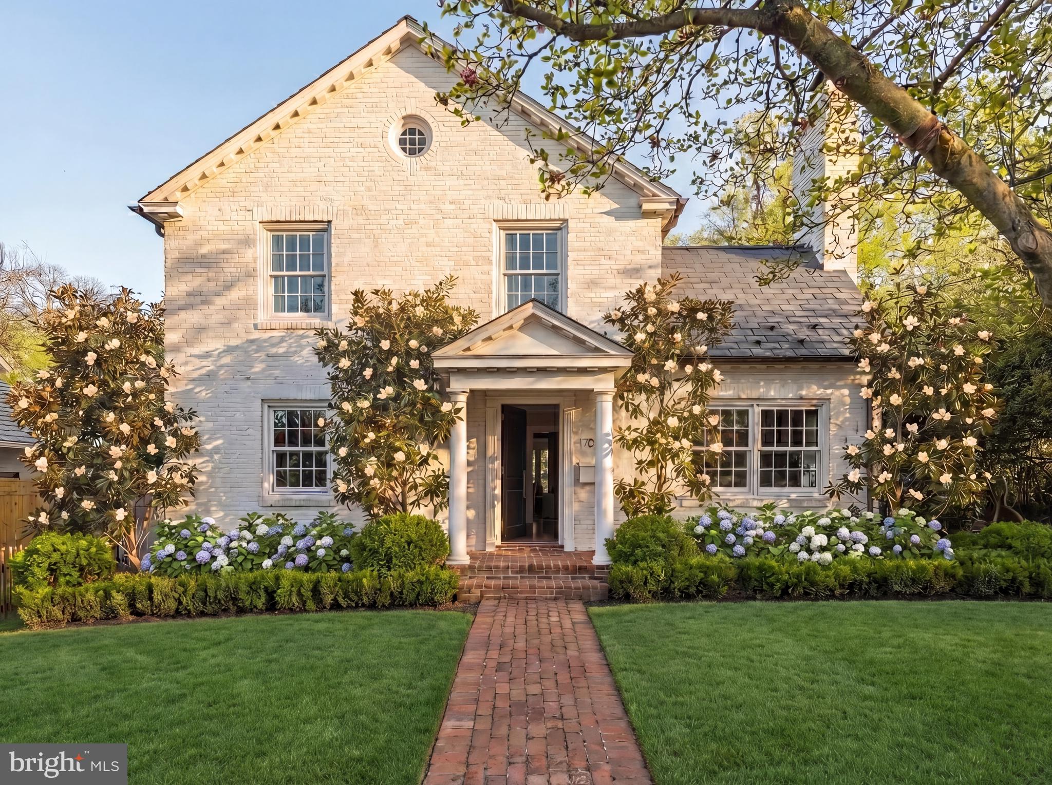 Set along one of Alexandria’s most quietly coveted corridors, 1704 Russell Road presents a refined balance of charm, connectivity, and everyday ease. Perfectly positioned between the historic allure of Old Town Alexandria and the vibrant, village like spirit of Del Ray, this location embodies a lifestyle that is both elevated and deeply rooted in community.

Originally reimagined in 2018 with a full two story rear addition by Akseizer Residential, the inaugural project that launched what is now a respected custom luxury homebuilding arm of Akseizer Design Group, the residence has been thoughtfully designed with a natural, intuitive flow that balances formal and informal living. The main level unfolds with effortless continuity, where light filled living spaces transition seamlessly into an expansive kitchen and family room, all oriented toward the rear garden creating an ideal setting for both everyday living and elevated entertaining.

At the heart of the home, the kitchen and family room serve as a sophisticated gathering space. A fully integrated Thermador appliance suite including a 48” dual fuel range with steam oven, panelized refrigeration, freezer, and wine tower is paired with custom millwork by Akseizer Residential, offering tailored storage and a full height pantry. Quartz countertops with integrated sinks, a Waterworks brass bridge faucet, and a custom hood anchor the space, while a gas fireplace with a cast stone mantle and framed 65” display create a warm, refined focal point. Elevated supporting spaces include a bespoke butler’s pantry, designer mudroom, and a jewel box powder room are discreetly positioned to enhance functionality while maintaining the home’s elegant flow. Throughout, 7” wide plank white oak flooring, custom Quaker Windows, and whole house Lutron systems create a cohesive, elevated living environment.

Upstairs, the private quarters are thoughtfully arranged to provide both comfort and separation. The primary suite is positioned as a true retreat, featuring custom dual closets, Lutron automatic shades, and a spa inspired bath wrapped in Calacatta Gold stone, Waterworks fixtures, and a custom vanity. Secondary bedrooms and baths are equally well appointed, offering both privacy and flexibility for guests or family. The lower level extends the home’s livability with a generous recreation space, media area, and direct access to the rear yard creating a seamless indoor outdoor connection rarely found at this price point and location.

Equally compelling is the home’s site itself. The rear grounds have been intentionally designed as a private extension of the interior living space, anchored by a bluestone patio with a built in fireplace and outdoor kitchen featuring a Blaze grill, refrigeration, and integrated storage. Lush boxwood gardens and a full irrigation system frame the space, offering both beauty and privacy in an intimate outdoor setting ideal for entertaining or quiet retreat.

Modern living is seamlessly integrated through a fully automated home environment, including whole house Sonos audio, Josh AI control, commercial grade WiFi with exterior coverage, and direct Cat 6 wiring throughout. Just moments from the boutiques, acclaimed dining, and waterfront beauty of Old Town, and with seamless access into Washington, D.C., the home also benefits from proximity to highly regarded public and private schools providing an added layer of long term value within an already exceptional setting.

Here, mornings begin with a stroll to a favorite café, afternoons unfold along nearby parks and trails, and evenings are spent immersed in the timeless character of Alexandria. 1704 Russell Road offers a rare opportunity to experience the very best of Alexandria living where historic charm, modern luxury, and an exceptional location come together with effortless grace.