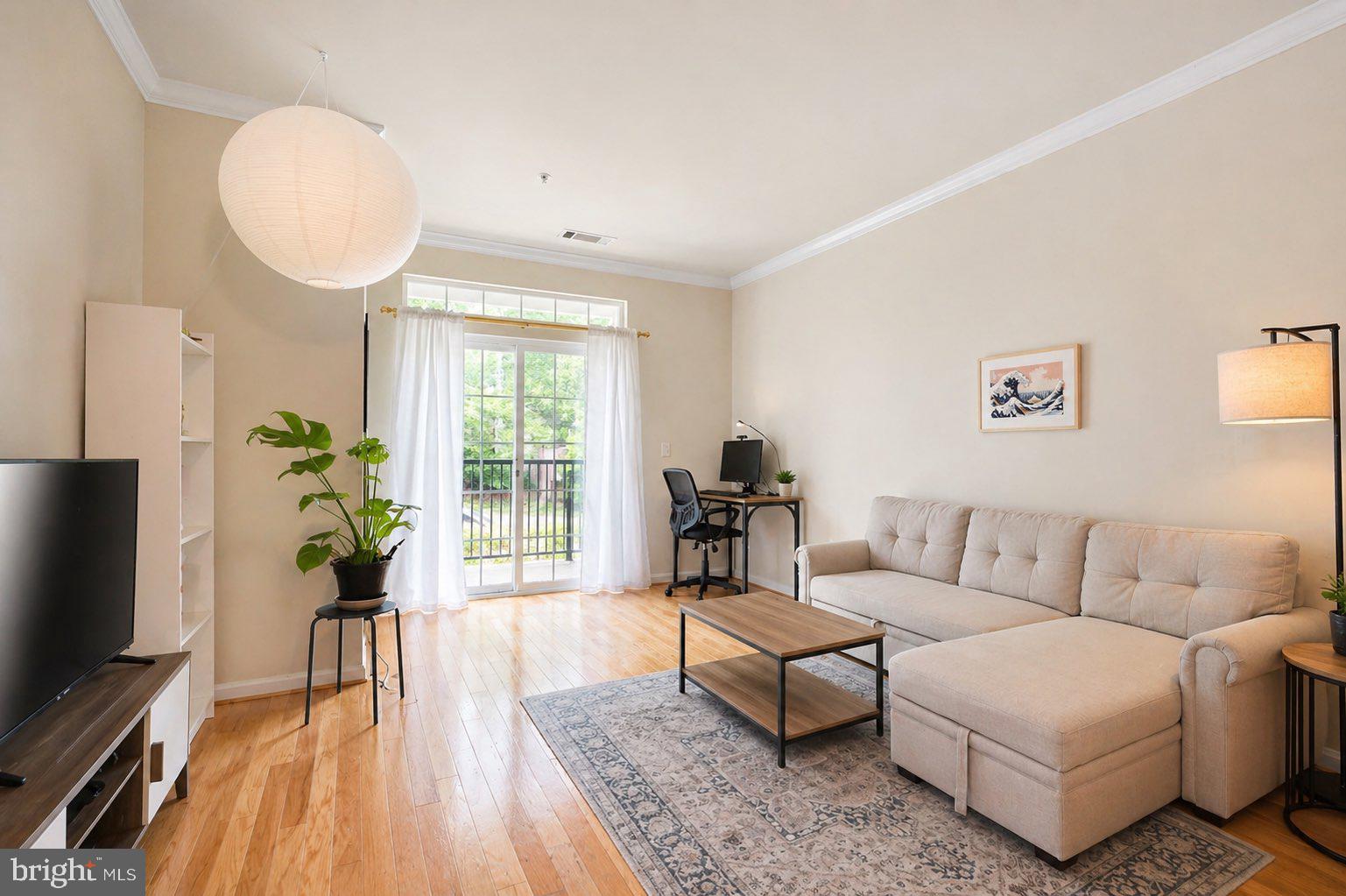 Welcome to The Grove at Arlington—an inviting, pet-friendly community offering comfort, convenience, and an impressive array of amenities. Residents enjoy access to a community swimming pool, grilling area, clubhouse, media room, fitness center, two bike storage rooms, library, secure package delivery area, and the added peace of mind of a full-time onsite building manager.

Ideally located, this home is less than 3 miles from Crystal City and Amazon HQ2, under 2 miles from Pentagon City Metro, and just minutes from Reagan National Airport. With public transportation right outside your front door, commuting and city access couldn’t be easier.

This meticulously maintained condo offers a warm and bright living space featuring hardwood floors, granite countertops, and stainless steel appliances. Additional highlights include a ceiling fan, in-unit washer and dryer, and a private sliding glass door that fills the space with natural light. The unit also conveys with a covered garage parking space and a 15-square-foot storage unit for added convenience.

A perfect blend of location, lifestyle, and low-maintenance living—this move-in-ready home is ready for its next owner.