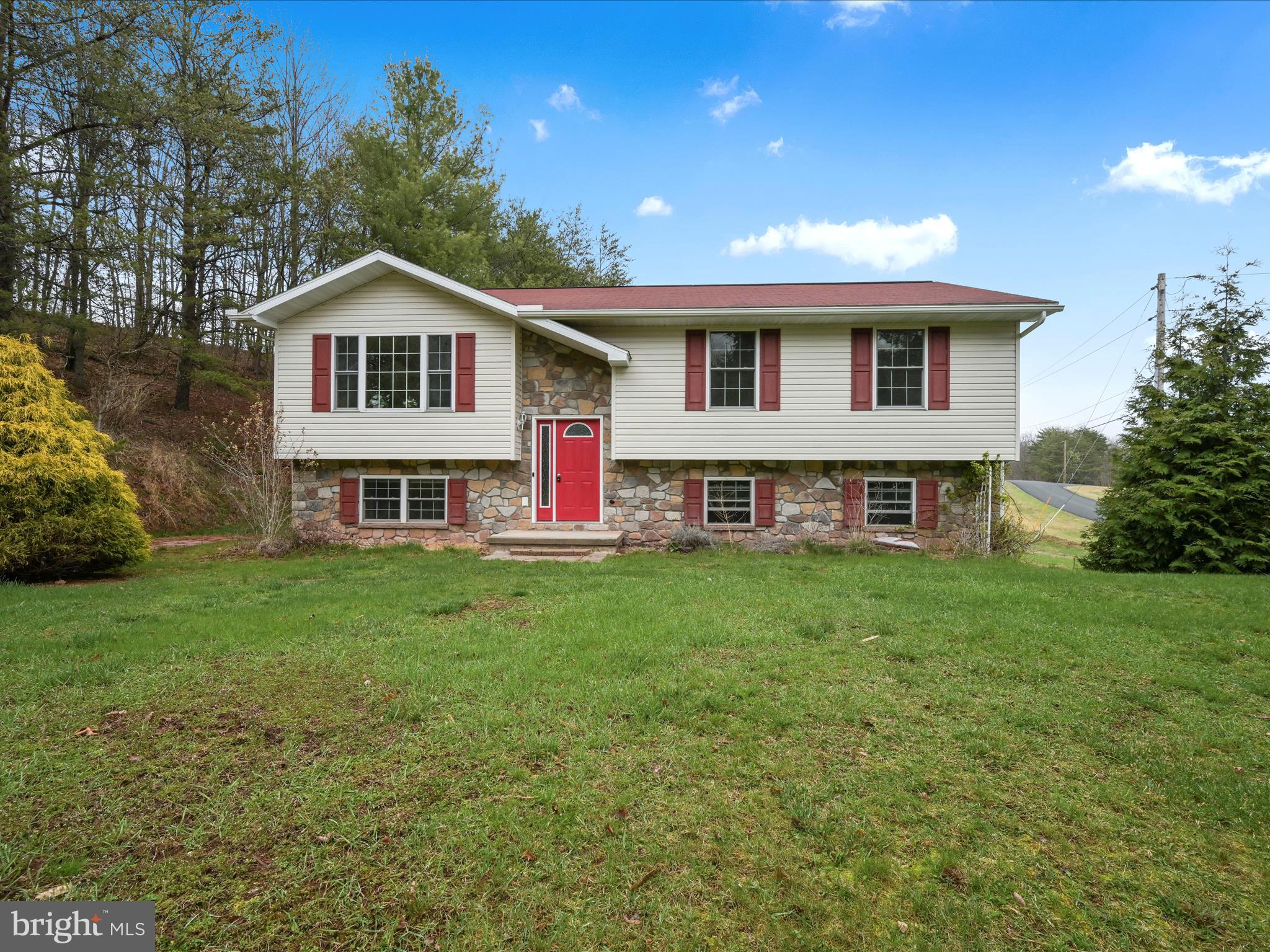 Discover the ultimate in lake and mountain living with this affordable, spacious 2BR/2BA newer bi-level home in the sought-after Lake Wynonah community. Main floor bedroom with 3-4 closets is large enough to be divided into 2 rooms, making this a comfortable 3 bedroom home if desired. Nestled on a private, 0.3 acre lot with mature trees, this property backs to farmland and offers a tranquil setting while providing easy access to the lake, community amenities, and major highways. With a versatile layout, this home currently features 2 generously sized bedrooms and 2 full bathrooms. Kitchen with center island, dining area and living room flow seamlessly together to create the perfect open space for ease of everyday use and/or entertaining. Main floor laundry. There is great potential for a spacious, custom deck to be built just off the kitchen/dining area. A full, finished basement with a cozy family room, bedroom, bathroom and access to 1-car garage completes this ideal home. Septic system is a Puriflo Peat System. Easy access to the East Gate of Lake Wynonah. Lake Wynonah Property Owner's Association maintains a 6-month minimum term rental policy. Lake Wynonah is a gated, HOA community featuring 2 gorgeous, pristine, spring-fed freshwater lakes (Lake Wynonah is approximately 90 ft. deep and Fawn Lake 45 ft. deep at deepest areas). Amenities include: business office/gathering room/library, lodge w/dining and bar, social clubs, boating, fishing, wakeboarding, waterskiing, tubing, paddleboarding, tennis, pickleball, several parks/pavilion, basketball/volleyball courts, horseshoe pits, 2 pools, beautiful docks, hiking, natural wildlife and marina. Groups and events include: Active Civic Association, Concerts, Book Group, Pinochle Group, Volunteer Programs, Fish & Boat Group. Located less than an hour from Allentown, Harrisburg, Hershey and Reading. Close to Philadelphia and surrounding suburbs. Beat the beach traffic and settle in at the lake. Lake Wynonah is "Life On Vacation"!