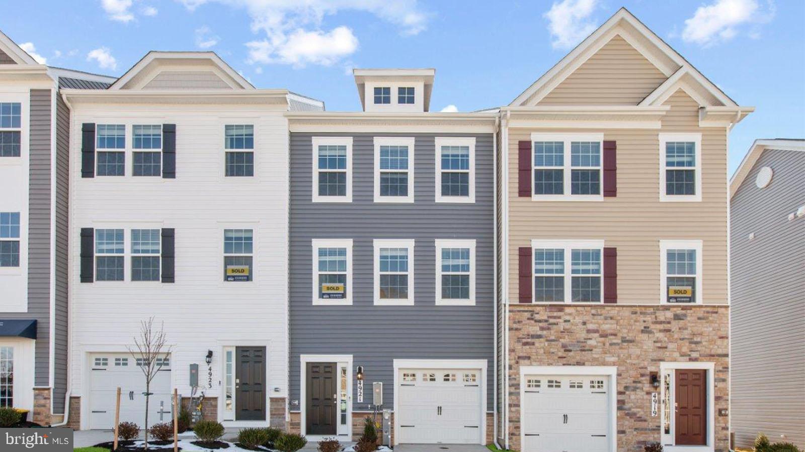 New Construction Ready Now! Move now and enjoy summer at the community pool. 
This brand-new 3-story open-concept home offers 3 bedrooms, 2.5 baths, 1-car garage, and 1,969 sq. ft. of versatile living space designed to fit your lifestyle. Step into a bright and welcoming foyer that leads to a spacious lower-level den, complete with a closet and full bath—perfect for a guest suite, home office, media room, or play space.
Upstairs, the main level is made for both everyday living and entertaining. Enjoy a light-filled living and dining area with recessed lighting and a large eat-in island. The designer kitchen is a true standout, featuring crisp white cabinetry, quartz countertops, and a stunning suede grey herringbone backsplash—a sophisticated combination that blends warmth and modern elegance. Just off the kitchen you step outside to your private deck—perfect for morning coffee or evening gatherings.
A conveniently located powder room completes the main level, while an open staircase leads to the upper floor. Here, you’ll find two generously sized secondary bedrooms, a full bath, and a centrally located laundry area for added convenience.
Retreat to your private primary suite, a true oasis featuring a spa-inspired bath with a glass walk-in shower, dual vanities, and an expansive walk-in closet.
Designed with the future in mind, the garage is pre-wired for an electric vehicle, offering added convenience for modern living. Enjoy the ease of smart home features with D.R. Horton AMERICA’S SMART HOME technology, including remote keyless entry, a SkyBell video doorbell, and more—bringing comfort, security, and connectivity right to your fingertips.
Located in a vibrant community just steps from The Avenue at White Marsh, you’ll have premier shopping, dining, and entertainment right at your doorstep. Residents also enjoy exceptional amenities including a community pool, playground, scenic trails, and more, creating the perfect blend of lifestyle and convenience.
This home truly has it all—style, space, location, and smart living—all in one exceptional package.