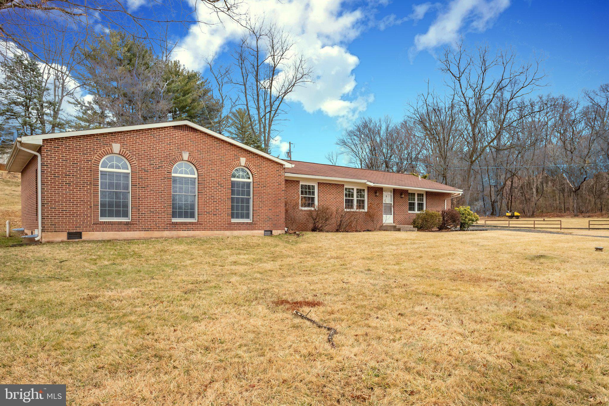 Beautiful and peaceful all brick rambler on 1 acre in the heart of Manassas City. One level living at its finest close to everything including restaurants, Walmart and Home Depot! Very quiet street and neighborhood. 4 spacious bedrooms (One bedroom could be used a nursery or study) with 3 full updated baths! Two master suites one with its own deck perfect for sipping morning coffee. Gleaming hardwood floors throughout. Cozy wood stove. Sun drenched kitchen leads out to large deck perfect for entertaining. Amazing home in an amazing location half mile to Liberia. Right across the street from Signal Hill Elementary. Never be late to school again!! NO HOA with extra long driveway with enough space for 8 cars and extra large 2 car detached garage. Pets case by case with deposit. Come fall in love!!!