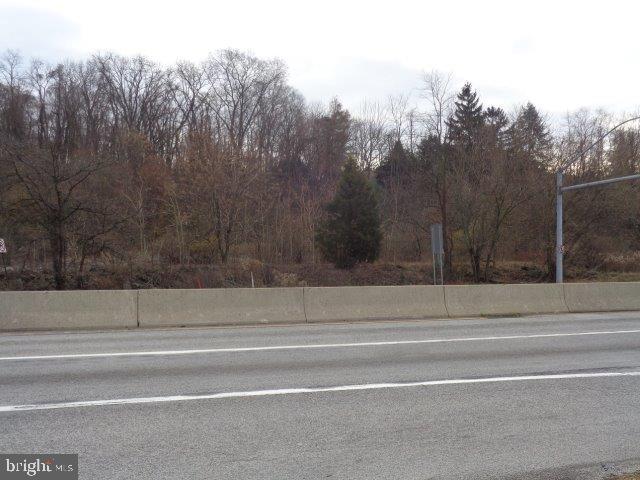 1.35 acre commercial lot along busy U.S. Route 15 in Dillsburg, Pa. 38,000 cars/day traffic count. Public water & sewer are available to the site. Available for land lease too @ $2500/month NNN. See associated docs for additional info.