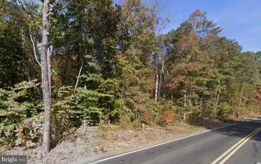 Approx. 15.97 acres in a prime location offering endless potential! This large tract presents a rare opportunity for builders, investors, or those looking to create a private estate. Ideal for building a custom single-family home or exploring the possibility of a small subdivision. With ample space and a desirable setting, this property is perfectly suited for development or long-term investment. Don’t miss the chance to secure acreage in a sought-after area with strong future potential!