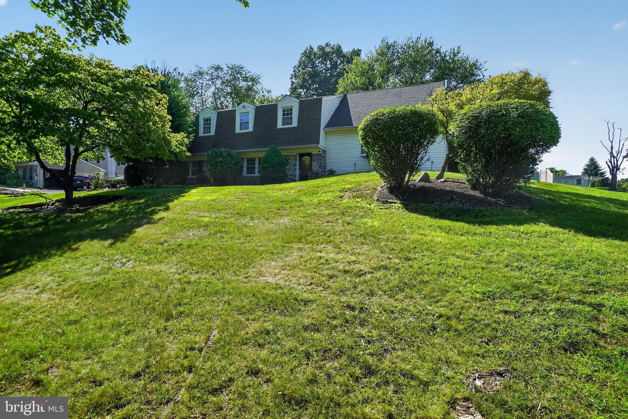 Welcome home to 26 High Point Drive, a beautifully spacious 4-bedroom, 2.5-bathroom split-level residence nestled on an expansive 0.41-acre lot in Northampton Township's highly sought-after Green Valley neighborhood. Offering 2,442 square feet of well-designed livable space, this home blends traditional comfort with room to grow. The main living areas are bright and inviting, leading down to a cozy family room complete with a warm fireplace and fantastic light filled sunroom. Upstairs features  four generously sized bedrooms, providing excellent flexibility for a dedicated home office, guest rooms, or a home gym. Step outside to your expansive, tree-lined backyard canvas, ideal for outdoor dining, gardening, or entertaining. Complete with an attached 2-car garage and situated in the award-winning Council Rock School District, this property balances peaceful suburban living with unparalleled access to local parks, shopping, and major commuter routes. This home represents a fantastic opportunity in an established, high-value neighborhood where homes rarely hit the market. Property is being sold as-is. Don't miss the chance to make this property your own!