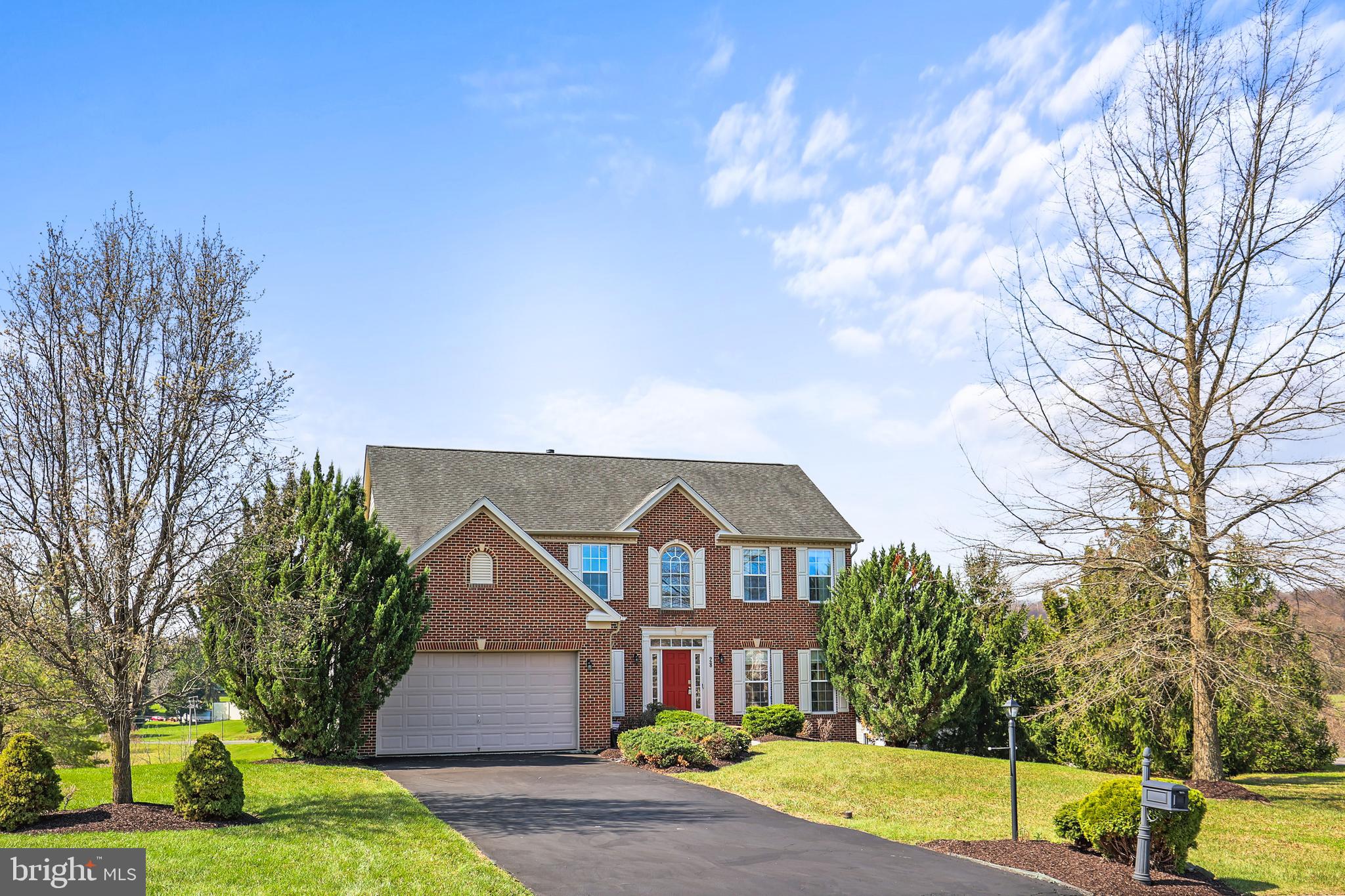 WELCOME TO SUMMIT RIDGE where you will find this custom built brick beauty. From the moment you enter the grand foyer you can't help but notice the natural sunlight, neutral decor, and the beautiful hardwood floors that were installed in 2023.  The sq ftg in total is almost 4500 which includes 4 generous sized bedrooms on the 2nd floor.  The owners suite bathroom has a jetted tub and separate shower with double sinks and large walk-in closet.  The 1st floor boasts a private office w/french doors.  The family room has a gas fireplace and is open to the kitchen and breakfast/ morning room featuring oversized windows with amazing panoramic unobstructed views.  The kitchen has a center island and is complimented with all appliances, 42" cabinets and of course granite counters with easy access from the garage to the kitchen thru the mud room.  The floor plan perfectly flows to include a formal dining and living room.  That's NOT ALL...This home is ideal for in-law quarters with a private entrance.  Possible 5th bedroom, full bathroom, family room and kitchen area boasting plenty of natural sunlight.  There is surround sound and projector hookup there in lower level.  Outside you'll find plenty of apple, pear, plum, peach, raspberry etc trees.  All the wood laminate flooring was installed in 2021 and the seller is leaving all the additional boxes for you.  You'll be happy to know there is 2 zone heat and air (1) unit replaced in 2020.   Great location for Harrisburg. Dillsburg or Mechanicsburg  areas.