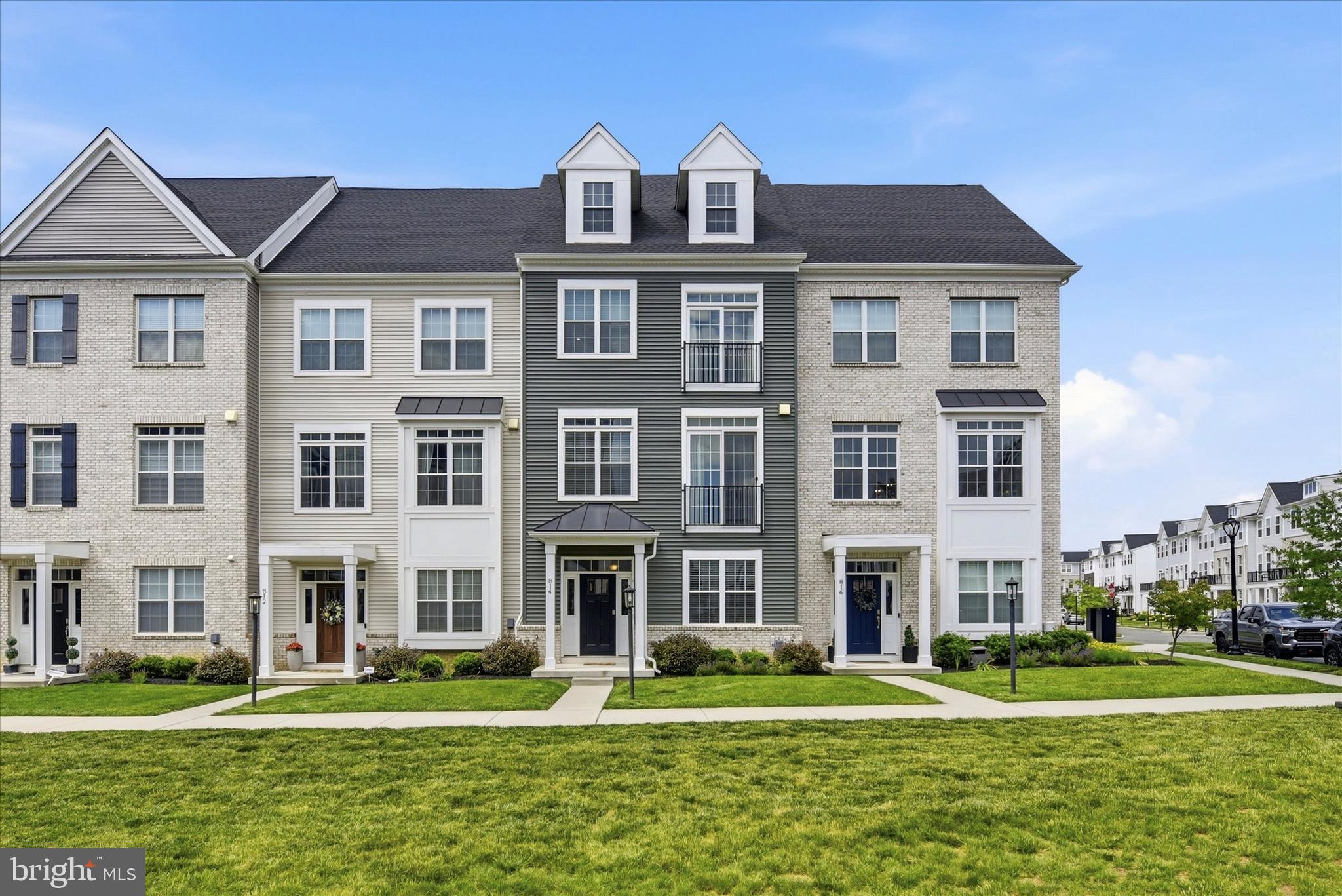 Welcome to 814 Furnace Court, a beautifully maintained 5-year-young Harrison Model townhome in the highly sought-after Steelpointe community, just steps from vibrant Downtown Phoenixville! This move-in ready home offers 3 bedrooms, 2.5 baths, a finished loft, and over three levels of thoughtfully designed living space.  The entry level features an oversized two-car garage, spacious den/office, and convenient hall closet. The main living level showcases an open floor plan with impressive 10-foot ceilings, abundant natural light, and 5" hardwood flooring throughout the foyer and main level. The gourmet kitchen is the heart of the home, featuring a large granite center island, classic tile backsplash, new pendant lighting, 42" cabinetry with crown molding, soft-close drawers and doors, pantry, stainless steel appliances, hood vent, and ample workspace for entertaining. The adjoining family room offers a cozy gas fireplace with mantel and sliding glass doors leading to a spacious deck. A convenient powder room completes this level.  Upstairs, the primary suite features a walk-in closet and private bath with double vanity, tile flooring, tiled shower, and linen closet. Two additional bedrooms, a full hall bath with double vanity, laundry room, and 9-foot ceilings complete the bedroom level.  The finished third-floor loft provides incredible flexibility and can serve as a fourth bedroom, home office, fitness area, media room, or playroom. Enjoy additional outdoor living space from the private upper-level rooftop deck—the perfect spot for relaxing, entertaining, and celebrating America's 250th Anniversary while watching fireworks from the comfort of home! Built by renowned Rockwell Builders, this exceptional home combines quality craftsmanship with an unbeatable location. Walk to Downtown Phoenixville's restaurants, shops, breweries, entertainment, and year-round community events. Conveniently located near Routes 76, 202, 422, and the Pennsylvania Turnpike for an easy commute. Don't miss this opportunity to own a stunning home in one of Phoenixville's most desirable communities!
