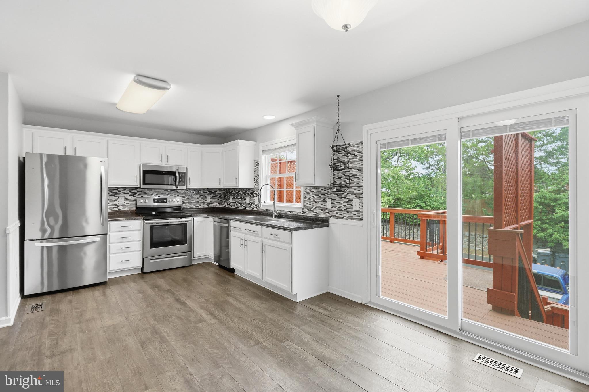 *Open House:  Sunday, July 5 from 1-3pm *LOCATION LOCATION LOCATION * Price reduced by $40K**Rarely available end-unit townhome in the sought-after Ashburn Manor community! This beautifully maintained home offers 3 bedrooms on the upper level and has been lovingly cared for by its original owner.


✨ Recent Updates Include:

• Roof replaced in 2024
• HVAC replaced in 2022
• Updated kitchen with stainless steel appliances
• LG refrigerator (2020)
• Frigidaire Microwave & Stove  (2020)
• Whirlpool Dishwasher (2022)
• Luxury vinyl plank flooring throughout
• Updated bathrooms
• Custom closet systems in all bedrooms
• Ceiling fans in every bedroom
• Recessed lighting throughout the main and lower levels

Step outside to enjoy the oversized deck with privacy fencing, stairs leading to the fenced backyard, and a lower-level patio perfect for relaxing or entertaining.
The lower-level recreation room features a custom drop zone just inside the back entrance, providing convenient access from the two assigned parking spaces located directly behind the home.
Located in historic Old Ashburn, this hidden gem of an established neighborhood offers incredible charm and character. Just steps from the Washington & Old Dominion Trail and minutes from major commuter routes, shopping, dining, and everything Ashburn has to offer.
📍 Ashburn Manor neighborhood in the OLD Ashburn area

***Come discover why Ashburn Manor remains one of Ashburn’s best-kept secrets!