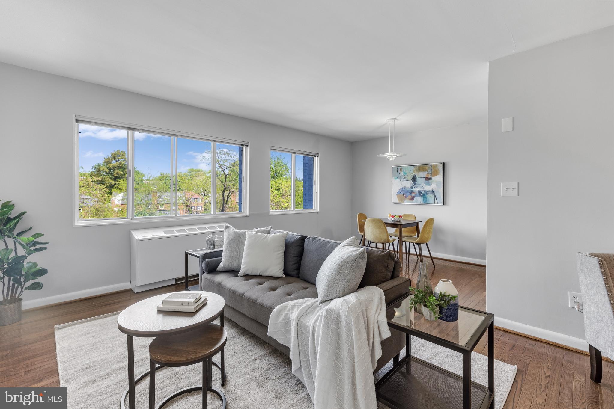 Beautiful 1-bedroom, 1-bathroom third-floor home in Stratton House Condominium! A spacious & bright living room welcomes you with large windows & gleaming hardwood floors, creating an inviting space for both relaxing & entertaining. The separate dining area is accented by a pendant light. The updated kitchen is both stylish and functional, featuring soft-close white cabinetry with modern pulls, tile flooring, a subway tile backsplash, stainless steel appliances, quartz countertops, a pantry closet, & overhead lighting. A hallway with a large storage/linen closet adds convenient everyday functionality. The bathroom includes tile flooring, an updated vanity, a large medicine cabinet mirror, & a tiled shower with corner shelving. The light-filled bedroom offers plush carpeting, overhead lighting, & two closets, including a walk-in closet for ample storage.

The condo fee includes ALL utilities, offering exceptional value, and this home also comes with a separate storage unit & access to a common laundry room. Enjoy a variety of community amenities, including an outdoor pool, picnic tables & grills, a play area, an outdoor fireplace, & two high-speed EV chargers. Tucked on a quiet street yet just steps to restaurants and shops, this location offers the best of both worlds. Conveniently located just a quick 5-minute drive to I-395 and close to the Ballston Metro & the Columbia Pike corridor with endless dining & entertainment options nearby!