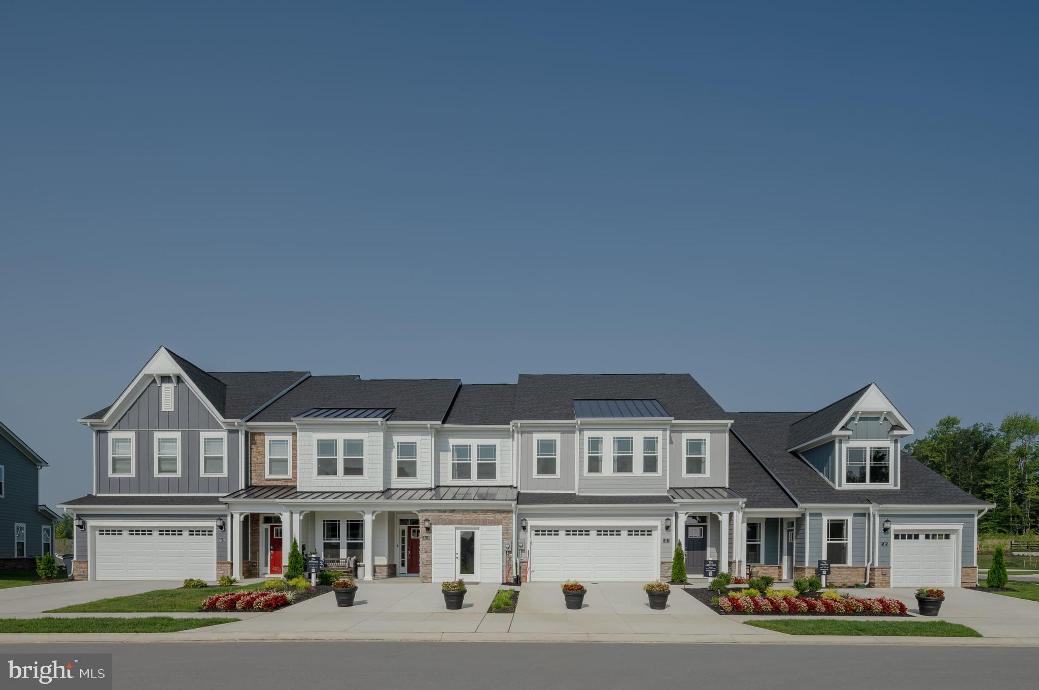 The Jefferson is a beautifully designed two-story home with a June/July move-in, offering a low-maintenance lifestyle without sacrificing space or style. The thoughtfully planned layout features a first-floor owner’s suite, flexible living space ideal for dining or entertaining, and an open kitchen and family room highlighted by soaring ceilings. The owner’s suite is a true retreat, complete with two walk-in closets and a spa-inspired bath featuring a quartz-topped double vanity and a spacious seated shower. The kitchen showcases Designer Select finishes, including staggered-height Maple Slate cabinetry, Iced White Quartz countertops, and a full suite of stainless-steel appliances. Enjoy a 5-burner gas cooktop, direct-vent range hood, built-in microwave, counter-depth French-door refrigerator with water and ice dispenser, and a hidden-control dishwasher—style and convenience combined. Sliding glass doors from the family room open to a screened-in porch, perfect for relaxing with a good book, with stairs leading to the rear yard for even more outdoor enjoyment. Upstairs, a central loft is flanked by two secondary bedrooms with a shared bath, while a third bedroom with an en-suite bath offers privacy for guests. An additional finished space with a walk-in closet provides flexibility for an office, craft room, or extra storage. The full basement expands your living options with a finished recreation room, full bathroom, and areaway to the rear yard—ideal for entertaining, relaxing, or hosting visitors. The exterior is just as impressive, featuring a covered front porch, horizontal cement board lap siding, and stone and batten accents that enhance curb appeal while keeping maintenance to a minimum. Heights at Hunt Valley is a new 55+ community, thoughtfully designed in intimate clusters of three homes. Residents enjoy an active lifestyle with multi-use trails, a fire pit, and grilling area. It’s the perfect place to downsize while staying close to family, shopping, dining, and entertainment at Hunt Valley Towne Centre and Towson Town Center, as well as nearby healthcare facilities including St. Joseph’s, GBMC, and Johns Hopkins. Photos are for reference only and may differ from the actual home. Prices, options, and availability are subject to change without notice.