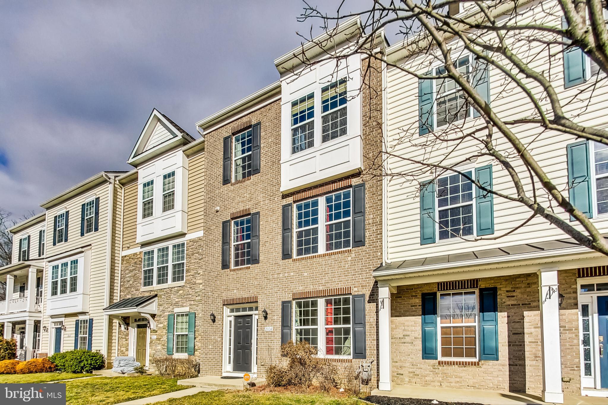 3 bedroom, 2.5 bath Luxury Townhome in Market Square Subdivision-- Fantastic light filled townhome! Step into a spacious sitting room with gleaming hardwood floors - perfect for entertaining guests. The main level features open concept living - featuring a gourmet kitchen with granite countertops, stainless steel appliances, oversized island and spacious pantry. The dining room is located just off kitchen for easy entertaining and features access to a composite deck with privacy fence. Large windows in living room let in lots of natural light! The third floor features a huge master bedroom with tray ceilings, a spacious master bedroom and ensuite bath. Two additional bedrooms and a hall bath complete this level! Laundry room conveniently located on the bedroom level. Rear entry 2 car garage with tons of storage space. Easy access to dining and shops and access to walking path!