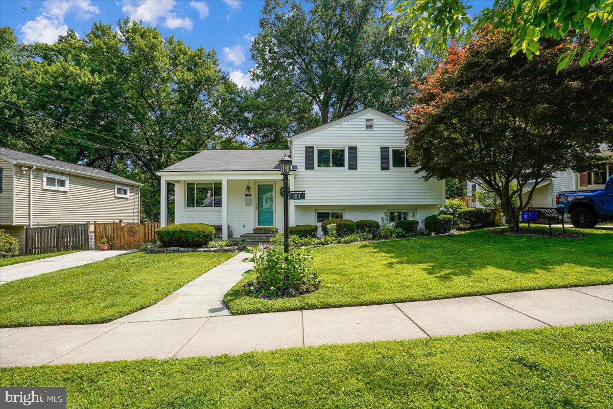 Prepare to be charmed by this picturesque 4-level split in the sought after Newport Hills neighborhood of  Kensington. The "charm offensive" begins the moment you pull up to the curb, greeted by a beautifully remodeled front porch (2026) that practically begs you to sit and stay a while. Inside, the home is just as captivating, featuring a bright, open-concept main level where the updated kitchen—complete with granite counters, sleek new cabinetry, and counter seating—flows effortlessly into the dining and living areas.

The layout offers space for everyone with both a spacious family room and a versatile recreation room, which features fresh 2025 flooring and lighting. Retreat to the upper level to find three spacious bedrooms and two fully renovated baths, including a primary bedroom with a beautifully remodeled ensuite full bath. A fourth bedroom boasts its own ensuite half bath, perfect for guests or a home office.

Modern updates abound, including newer windows, a primary bath renovation, and a hall bath refresh. Step outside to the awesome covered patio overlooking the landscaped yard, an ideal spot for morning coffee or evening dining regardless of the weather. With every appliance updated within the last decade and a layout designed for easy living, this one is truly move-in ready. Hurry—homes this inviting don't stay on the market long! Please check out the interactive floorplan!