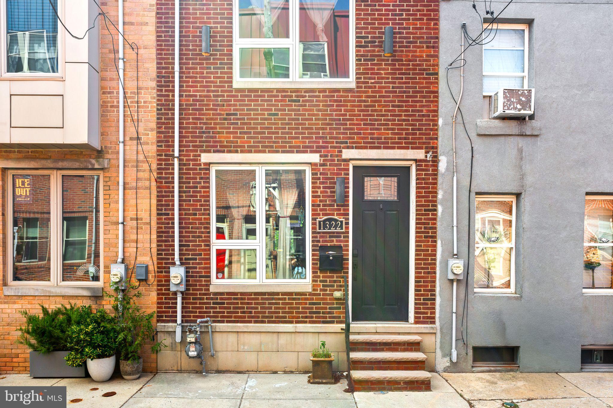 Welcome to 1322 S Chadwick - a beautifully maintained 3-bedroom, 3 full-bath townhome tucked into the heart of Point Breeze. Timeless Philadelphia red brick that's lined these streets for 250 years. A look that never goes out of style.

Step inside to a bright, open-concept first floor with a spacious living room, dining area, and kitchen—built for both easy everyday living and effortless entertaining.

The second floor offers two well-sized bedrooms, a full bath, and a convenient laundry closet with a stacked washer/dryer.

The entire third floor is dedicated to the primary suite, providing a private retreat with ample space and comfort.

Another standout is the fully livable finished basement, complete with its own full bathroom and a large walk-in shower. With its size and finishes, the space works beautifully as a second living area, home office, gym, or playroom - and could easily serve as a 4th bedroom or guest suite. Add in a private backyard and a full-length roof deck with 360-degree, unobstructed skyline views of the entire city.

Currently tenant-occupied at $2,850/mo through the end of July, 1322 Chadwick also presents strong investor potential for anyone looking to add to their portfolio in an appreciating neighborhood.

Located just a 10-minute walk from Passyunk Avenue, this residence blends neighborhood charm with urban convenience. Enjoy easy subway access for a seamless commute to Center City and the Stadium District, with Rittenhouse Square roughly 20 minutes away on foot. Everyday essentials are right around the corner, including Sprouts, Giant, and Target at Broad and Washington.
Schedule your private showing today—a gem like this, with a view like this, won't last long.