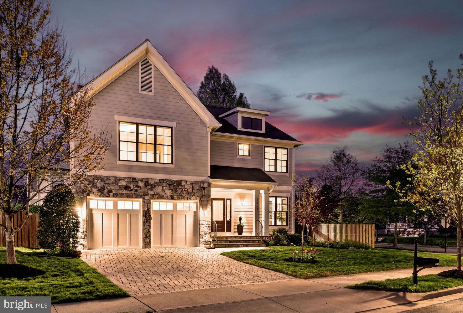 OFFER DEADLINE: Monday, 4/13 @ 12 PM. Wonderful MASTERPIECE Built in 2018, this stunning Modern Craftsman commands a premier corner lot, offering over 5,200 sq. ft. of sophisticated living space across three impeccably finished levels (per professional measurement). The striking stone-and-hardiplank exterior provides instant curb appeal, leading to a home designed for the most discerning buyer.
Inside, all three levels of this home feature soaring 9-foot+ ceilings, creating an incredible sense of volume and light. The main level impresses with gleaming hardwoods and a floor plan that flows seamlessly from the grand foyer to the expansive living areas. The true Chef’s Kitchen is a showstopper, featuring professional-grade appliances, a massive center island, and a bespoke Butler’s Pantry. Designed for modern convenience, the main level also includes a dedicated mudroom providing direct interior access to a attached 2-car garage. Retreat to the upper-level sanctuary, where the sprawling Primary Suite offers a tray ceiling and a spa-like bath with a soaking tub and dual-vanity elegance. The fully finished lower level—also boasting 9-foot ceilings—is an entertainer’s dream with a massive recreation room, guest suite, and abundant storage. Enjoy the best of North Arlington with walkability to the Lee Heights Shops and the prestigious Discovery/Williamsburg/Yorktown school pyramid. No HOA! Modern luxury in an unbeatable location. Welcome home!