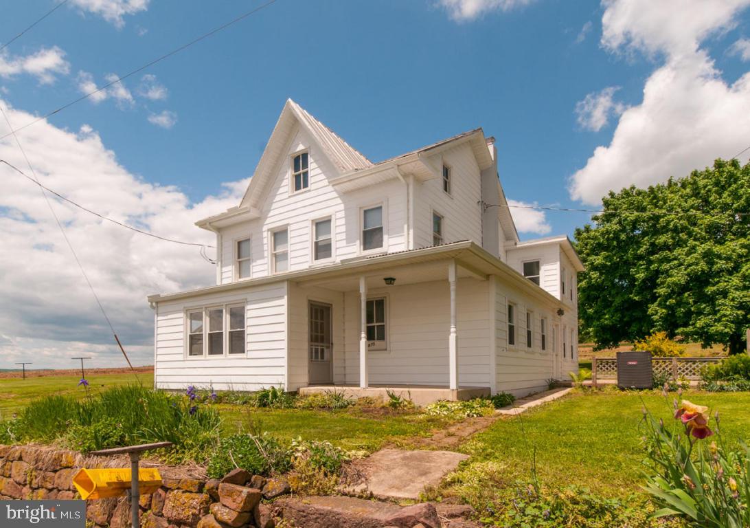 Bring your horses and animals to live at this amazing property. 4.1 tillable acres plus wooded lot in rear; endless possibilities. Redone farm house with new kitchen and baths, flooring, paint and lighting. 2-story 37x20 barn, oversized 42x20 garage, 35x14 chicken house all on 7.7 acres.