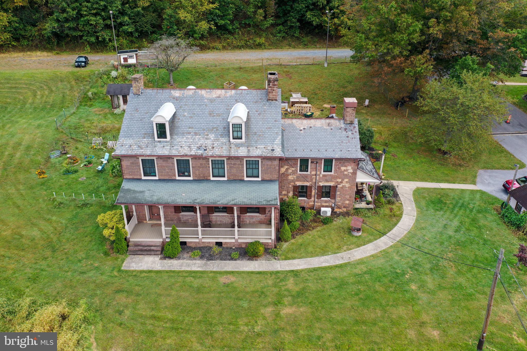 Great investment opportunity! This property consist of a recently renovated 6-unit apartment building with an additional guest suite/ hotel-style room, a 9,000+ sq. ft. bank barn converted to a multi-purpose building featuring office space on the lower level and a large auditorium that has been recently remodeled and is currently used by a local church and the Historic Hopewell Forge mansion built by Peter Grubb in 1740 with over 4,000 sq. ft of living space. Situated on 32 acres of undeveloped woodland by state game lands and close to all major roadways the possibilities are endless.