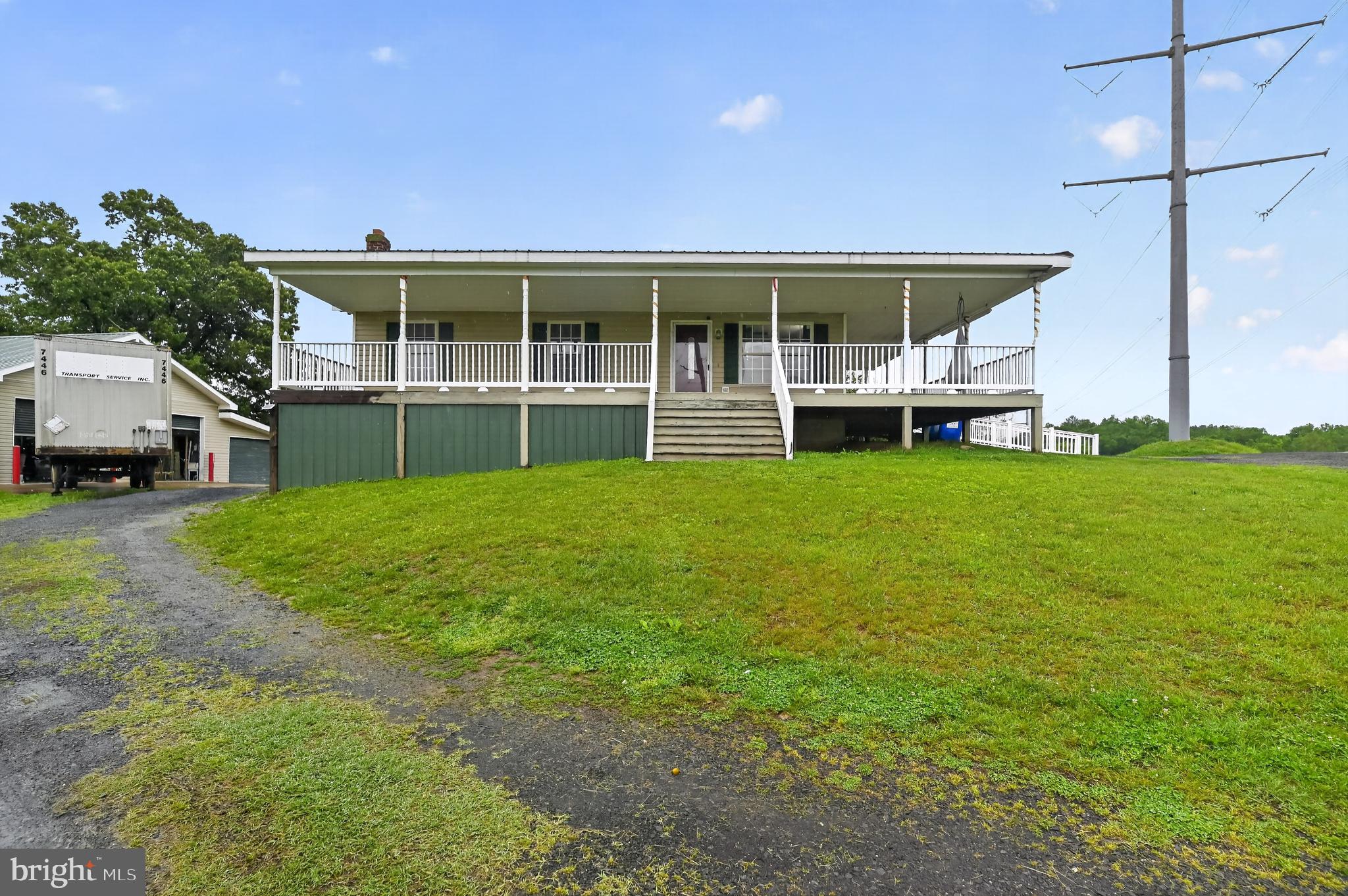 ****Attention this Gem won't last long ****

🏡 Welcome to 18628 Springs Rd, sitting on 3 beautiful acres of land. If you have been looking for space, privacy, and peaceful country living, this property delivers exactly that.

This spacious 5 bedroom home is all about enjoying the outdoors and having the freedom to truly spread out. With no HOA, you can enjoy country living your way. From the moment you arrive, the country charm stands out, starting with the metal roof newly installed and the inviting wraparound porch perfect for relaxing mornings and peaceful evenings.

The front porch stretches an impressive 50 feet long and 10 feet wide, while the side porch offers even more outdoor space to enjoy. Maintenance free vinyl railings and a side entry ramp add both convenience and functionality.

✨ One of the standout features of this property is the massive detached 30x40, 6 car garage with 14 foot ceilings and a commercial vehicle lift that conveys with the sale 🔥 Perfect for car enthusiasts, mechanics, business owners, hobbyists, or anyone needing serious workspace and storage. Opportunities like this are hard to find.

Inside, the home features an open floor plan with easy to maintain laminate flooring, crown molding, and chair rail details throughout. You will also appreciate the convenience of main level laundry, plus an additional washer and dryer hookup in the basement.

This home offers incredible potential and is ready for your personal updates and finishing touches. Whether you are looking for room to grow, space for hobbies, or simply a peaceful property where you can enjoy fresh air and wide open land, this property checks all the boxes 🌳