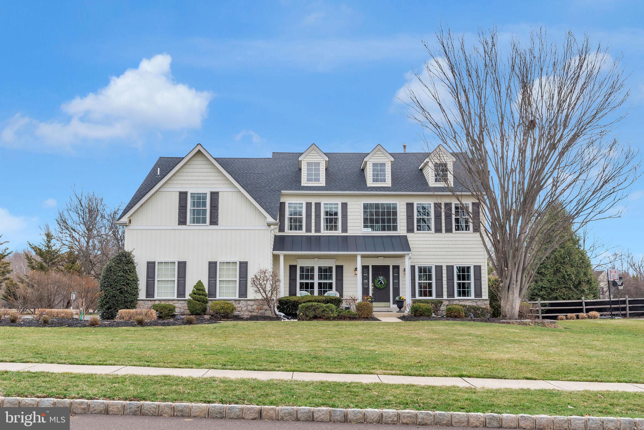 Located in the award-winning Central Bucks School District and the highly sought-after Doylestown Lea community, 72 Bittersweet Drive is a meticulously maintained, move-in-ready 4-bedroom, 2.1-bath home where thoughtful updates and quality upgrades shine. Custom silhouette shades and designer window treatments provide a polished feel while beautifully framing the natural light that flows throughout. The foyer sets an immediate tone of elegance with gleaming hardwood floors that stretch across the entire first level. To one side sits a private office behind French doors; to the other, a comfortable living room opens naturally into the formal dining room. The chef’s kitchen serves as the heart of the home, featuring granite countertops, a classic backsplash, and premium stainless steel appliances, all anchored by a heated island, perfect for catching up on emails over morning coffee. The kitchen flows into a breakfast nook that opens directly onto a cedar screened-in porch. It's a true three-season retreat framed by lush landscaping that provides a private, garden-like atmosphere from spring through fall. Off the breakfast nook, the great room showcases a stunning wall of windows that floods the space with light, making it the ideal gathering point for lazy Sunday mornings or lively get-togethers. Completing the first floor is a dedicated laundry room conveniently located off the garage with ample storage. Upstairs, four well-proportioned bedrooms offer plenty of space to unwind. The primary suite is a serene sanctuary, featuring a dedicated sitting room that connects the bedroom to a beautifully updated bathroom. The suite is rounded out by a walk-in closet plus two additional closets, making storage effortless. A motorized shade provides convenient light control at the touch of a button. The second floor is completed by a second updated full bath with clean finishes and modern fixtures. The finished lower level is thoughtfully divided into a versatile living area, equally suited for a home theater, fitness studio, or recreation room, alongside a dedicated storage space. The home’s mechanical profile demonstrates true pride of ownership, featuring a whole-house Generac generator paired with a sump pump with water pressure backup for ultimate peace of mind. Located just steps from Doylestown Central Park, which includes the award-winning Kids’ Castle and the recently opened Township Community Center boasting brand-new tennis, pickleball, and basketball courts, this home offers direct access to the scenic Neshaminy Greenway Trail, putting the best of Bucks County recreation at your doorstep. With downtown Doylestown’s vibrant dining and shopping just minutes away and easy access to major commuter routes, 72 Bittersweet Drive delivers the perfect blend of luxury and location. Schedule your private showing while this opportunity lasts!