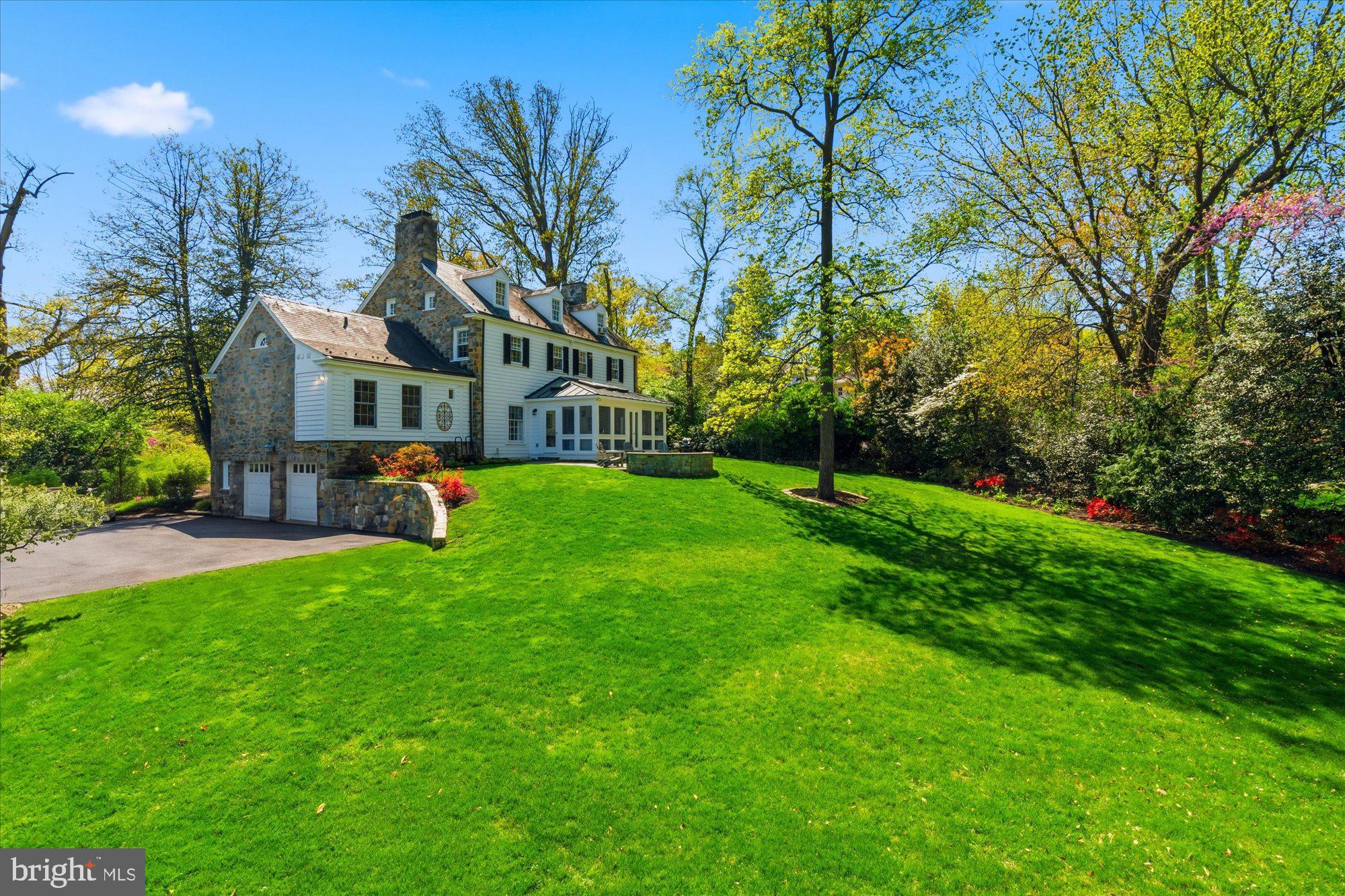 Where Heritage Meets Modern Luxury

Poised on an extraordinary half-acre lot—a rare sprawling sanctuary in one of Alexandria’s most coveted enclaves—this magnificent Southern Colonial is a masterclass in architectural grace. Boasting four fully finished levels of  living space, the residence blends the stately charm of 1940s craftsmanship with the sophisticated amenities required for 2026 living.

The Residence
Grand Scale Entertaining: From the center-hall entry, discover a traditional floor plan defined by 9-foot ceilings, authentic plaster walls, and rich wood flooring. The expansive 24-foot living room and formal dining room are anchored by one of the home’s three fireplaces, creating an atmosphere of warmth and prestige.

Chef’s Haven: The heart of the home features a gourmet kitchen equipped with a six-burner gas range, double ovens, and a sun-drenched breakfast room—perfect for casual mornings overlooking the lush grounds.

The Primary Wing: Uniquely positioned for convenience, the main-level primary suite offers a private retreat with an en-suite bath, while five additional bedrooms including a second primary suite across the upper levels provide ample space for family, guests, or a dedicated home fitness studio.

Lower Level Leisure: The walk-out lower level is an entertainer's dream, featuring a massive 37-foot family room, a wet bar, and seamless access to the outdoors.

The Grounds & Location
Outside, the "garden-lawn" vistas offer a level of privacy seldom found just minutes from the nation’s capital. The premium landscaping and stone exterior provide "stop-and-stare" curb appeal that sets this property apart from anything else on the market. The outdoor firepit is several steps from the rear sun room - great entertaining flow!

Elite Education at Your Doorstep: Located in a premier "walkable" school zone—just half a block to Alexandria Country Day, three blocks to St. Stephen’s & St. Agnes and George Mason.

Connectivity: Enjoy the peace of a secluded estate while remaining mere minutes from the historic charm of Old Town Alexandria and the professional hubs of Washington, D.C.

Property Highlight: The rare slate roof and stone-and-wood construction reflect a level of "forever home" durability and classic style that modern builds simply cannot replicate.

NO  Public Open Houses are planned at this time.