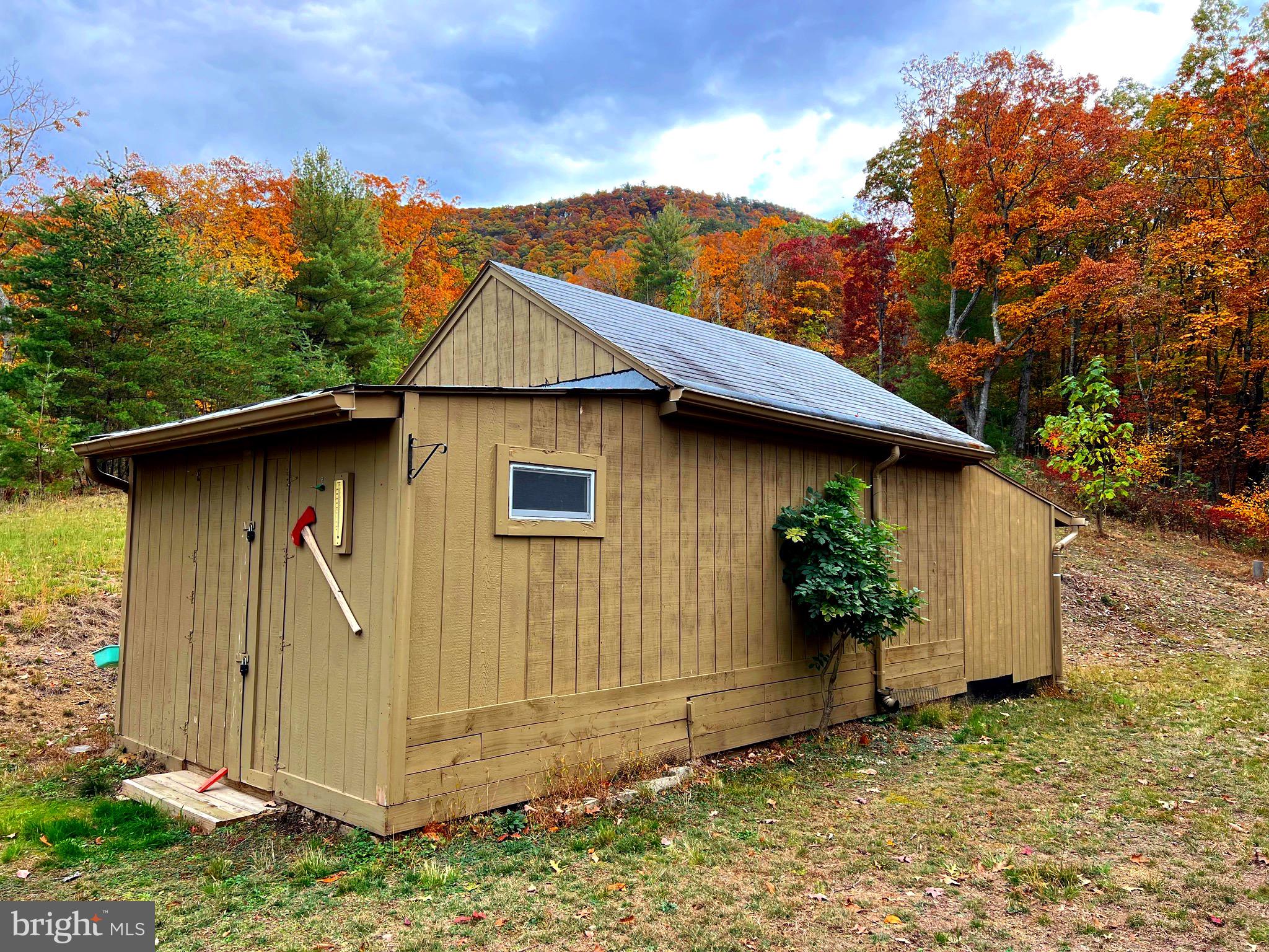 Great hunting on this 9.18 acre tract with a tiny house/work shop, electric, septic, and a land line phone for emergencies!  Fiber optic is also available. Owners of lots in Potomac Valley Overlook also have joint ownership in a 5.11 acre tract with a community picnic pavilion that includes a well and septic. This additional tract overlooks a twelve acre lake/flood control dam and affords beautiful mountain views to southeast and southwest.  You would also have access to 15,000+ acres of GW National Forest for your hunting, hiking and biking enjoyment! View  Reynolds Knob from Lot 38 and additional panoramic views from the miles of  Potomac Valley Overlook's interior roads. ATV's seem to be permitted if ridden responsibly. Lot 38 offers two cleared potential building sites. One currently used for private gun range by seller. Mineral rights convey!