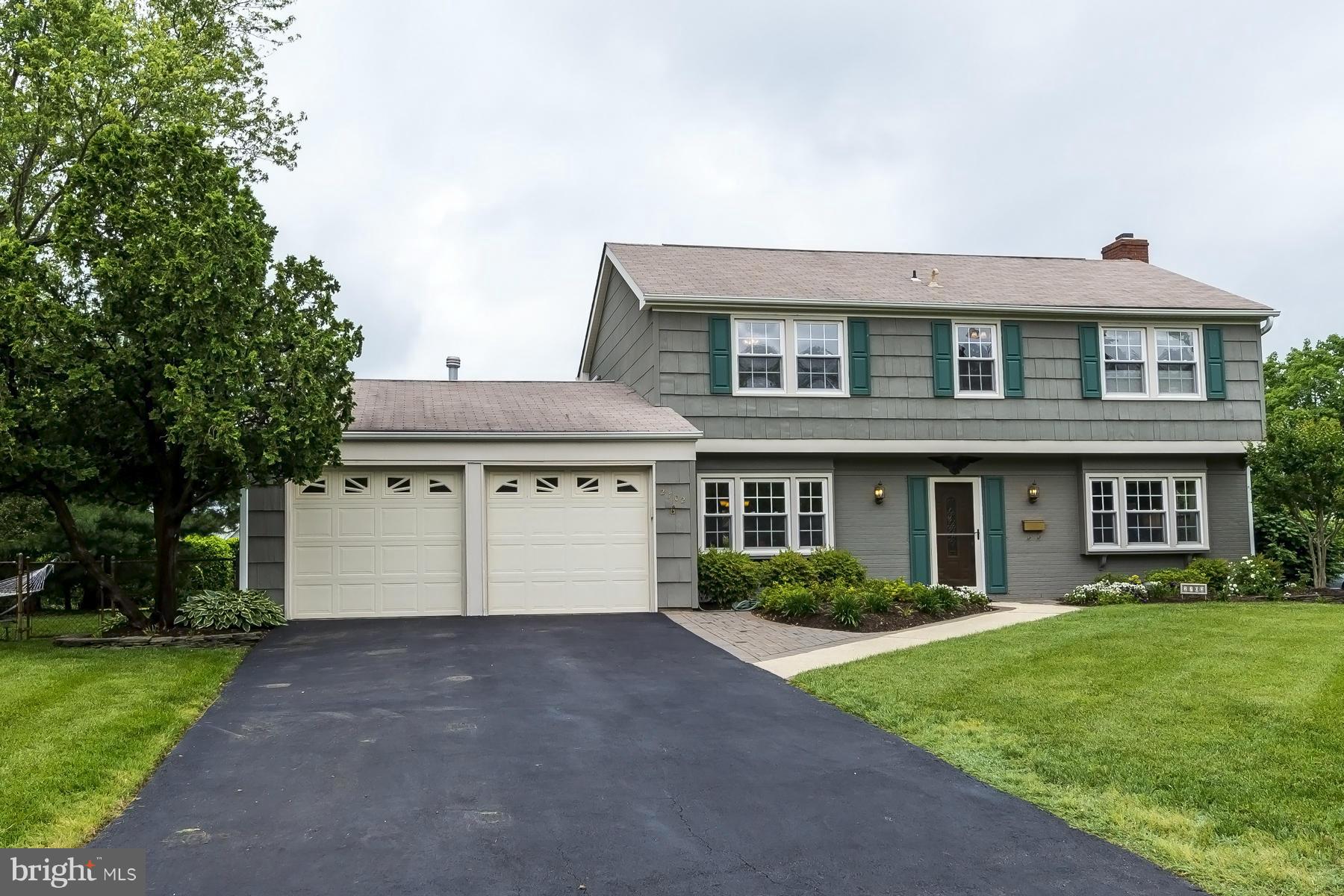 4 bdrm/2.5 bath boasts living rm w/wd brng fp; formal dining rm; kitch w/pantry, bi micro & newer cabs/gar.disposal; baths updated; lots of new windows; fam rm w/blt-ins; new gutters/trim/ridge vent/insulation/HWH/roof vent pipes/front & strm door/auto gar doors & openers; fresh paint in & out; attractive landscaping w/pavers, covered patio; 2car w/wkshop; fenced bkyd perfect for relaxing/entertg.