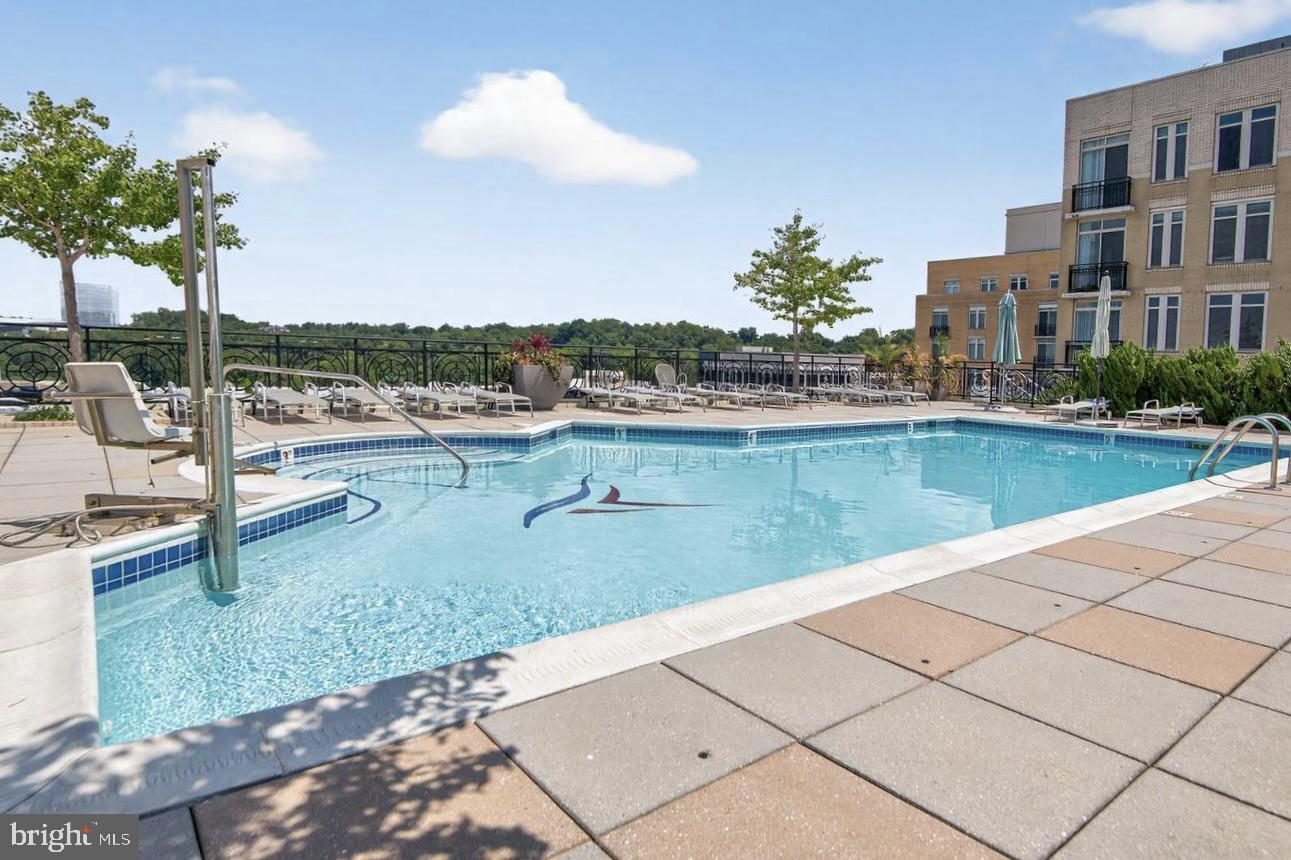 Affordable Waterfront Living in the Heart of National Harbor ...   Welcome home to this move-in-ready, contemporary two-bedroom, two-bath condominium offering approximately 1,200 square feet of beautifully designed living space in National Harbor’s vibrant waterfront community. Priced at $410,000 unfurnished or $420,000 furnished, this spacious residence offers exceptional value and the opportunity to enjoy a resort-inspired lifestyle every day. With year-round activities, waterfront events, acclaimed dining, shopping, and entertainment just outside your door, coming home truly feels like arriving at a destination.  It's open-concept floor plan blends modern finishes with turnkey convenience. Highlights include Brazilian hardwood floors, granite countertops, stainless steel appliances, an in-unit washer and dryer, two generous walk-in closets, Hunter Douglas window treatments, and secure underground parking. Residents enjoy an impressive collection of amenities, including a 24-hour state-of-the-art fitness center, a sun-drenched outdoor swimming pool, and a stylish club room featuring a pool table and piano—perfect for entertaining guests or simply unwinding. Spacious gathering areas and private balcony overlooking the marina, offering sparkling water views and a front-row seat to seasonal activities. Step outside and experience everything National Harbor has to offer, including:
• Acclaimed restaurants and waterfront dining
• Boutique shopping and everyday conveniences
• CVS and the National Harbor Medical Pavilion
• MahoganyBooks
• Relâche Spa at the Gaylord National Resort
• MGM National Harbor Resort & Casino
• The Capital Wheel, featuring panoramic views of Washington, D.C., Maryland, and Virginia
• Water taxi service to Washington, D.C., and Old Town Alexandria
With convenient access to major commuter routes and nearby Metro connections, commuting, traveling, and weekend getaways are a breeze. This is more than a condominium—it is an opportunity to enjoy contemporary comfort, waterfront energy, and destination-style living at an attainable price.  Make National Harbor your home and experience resort-style living every day.