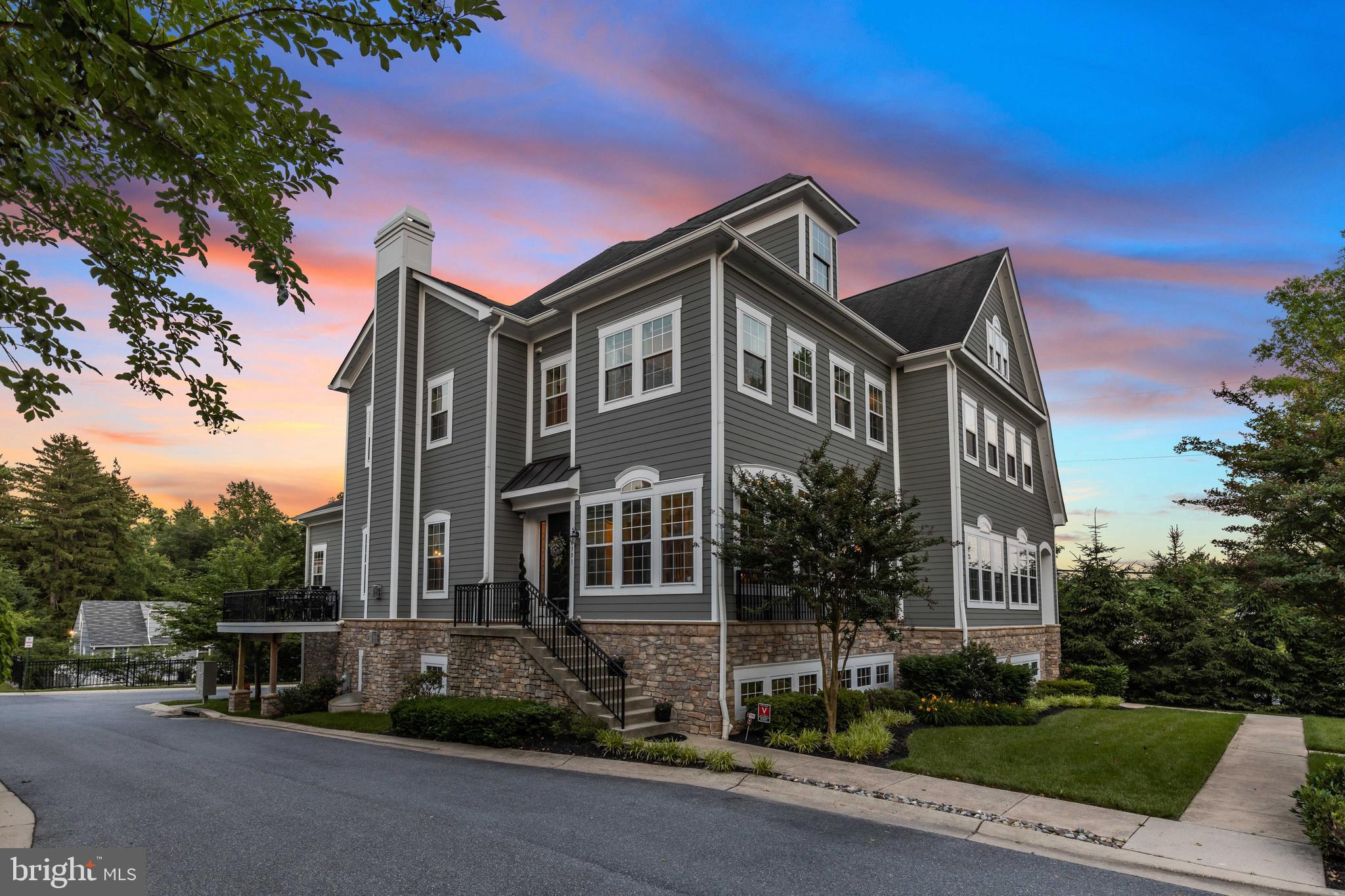 **ELEVATOR HOME**Welcome to 6301 Canter Way where new construction craftsman meets French Traditional Style. These homes were designed and built by Tommy Bozzuto with every custom upgrade available added by the seller throughout the construction process. From crown moldings to designer hardware to meticulously articulated accent walls painted throughout; this home screams luxury classic of the finest kind. Each and every drawer, closet, and storage area are equipped with purposeful custom shelving and soft close features where appropriate. Walk in through the front door into the main level where you will see the sitting room and dining room to the right. The windows in this room have been unidirectionally tinted so that furniture does not fade. Towards the back of the dining room the owner had a custom built credenza with cubbies for all of your entertaining needs such as napkin drawers, fine silver drawers, a large tray organizer, and more. From the dining room to the kitchen you will walk through the custom built butlers pantry where wine can be kept cold in the wine fridge, accent lights shine through the leaded glass cabinets, and pull out shelving allows for easy access to back of the cabinet items. From the back hall butler pantry into the kitchen you will see the Merlot Cherry Cabints with custom appliance covers to match the Cherry. This kitchen screams gourmet with double bake and convection oven, custom utensil drawers, hand crafted hood cover to match the Cherry. Black granite counter tops and pearl ceramic backsplash accent the kitchen along with custom cabinet and ceiling crown moldings. The seller even had a custom made breakfast bar crafted to match all of the black granite. The family room is an open concept connected to the kitchen on the front of the home with a gas burning fireplace. Off of the family room there is access to an outdoor deck and double doors with accent sconces to the owners suite. Crown moldings and designer carpet flow through the owners suite in addition to its large walk in closet with custom shelving and graciously a sized in suite bathroom. Marble is used throughout the entire bathroom on floor, counters, and shower. The glass shower doors were crafted and installed by a glazier.  There is a vanity with small cosmetic sink on one side and a large traditional sink on the other side of the owners suite bathroom. Take the elevator or grand oak stair case up to the second level where you will find an office and two bedrooms with bathrooms in each and walk-in closets. A grand custom book shelf and glass door was added to the office for comfort and efficiency. The room to the right of the office has a custom crafted desk that runs the length of the wall. This room has two closets and a bathroom with pearl pho painted walls and the same type of custom shower that was used for the owners bathroom. Across the hall is the third bedroom with another walk in closet and a full bathroom with European shower and tub. Take the elevator or grand oak staircase down to the basement on the ground level. Walk out of the elevator into the basement lounge with full bar, dance room that could be used as a fifth bedroom, powder room, and catering pantry with laundry room. The entire basement is custom and filled with high end finishes including the porcelain tiles, crown moldings, pho painted walls and accent walls and Italian glass chandeliers. The bar has a dishwasher, fridge, microwave, and custom soft close drawers and cabinets for easy organizing. The bar top is made of fine walnut wood and was handcrafted and curved by a wood worker who traveled from New York. There is a fireplace in the lounge and an access door to the garage between the lounge and bar. The power room has plumbing that can easily be converted to a full bathroom with shower. The dance room can be used as an exercise room and has a mirror that runs the length of the wall. Laundry, Catering Room and storage are off of the dance room.