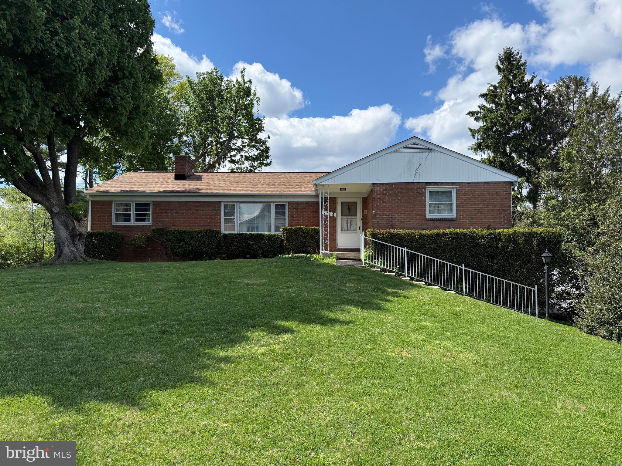 Large all brick rancher in established neighborhood. Perfect for a flip or starter home for a buyer with vision. New roof and heat pump within the last 3 years. 3 bedrooms, 1 bath, large eat in kitchen, formal living room with fireplace and family room with fireplace all on the main floor. Walk out basement is unfinished and has a double deep 2 car garage. This is an estate sale and is "AS IS"