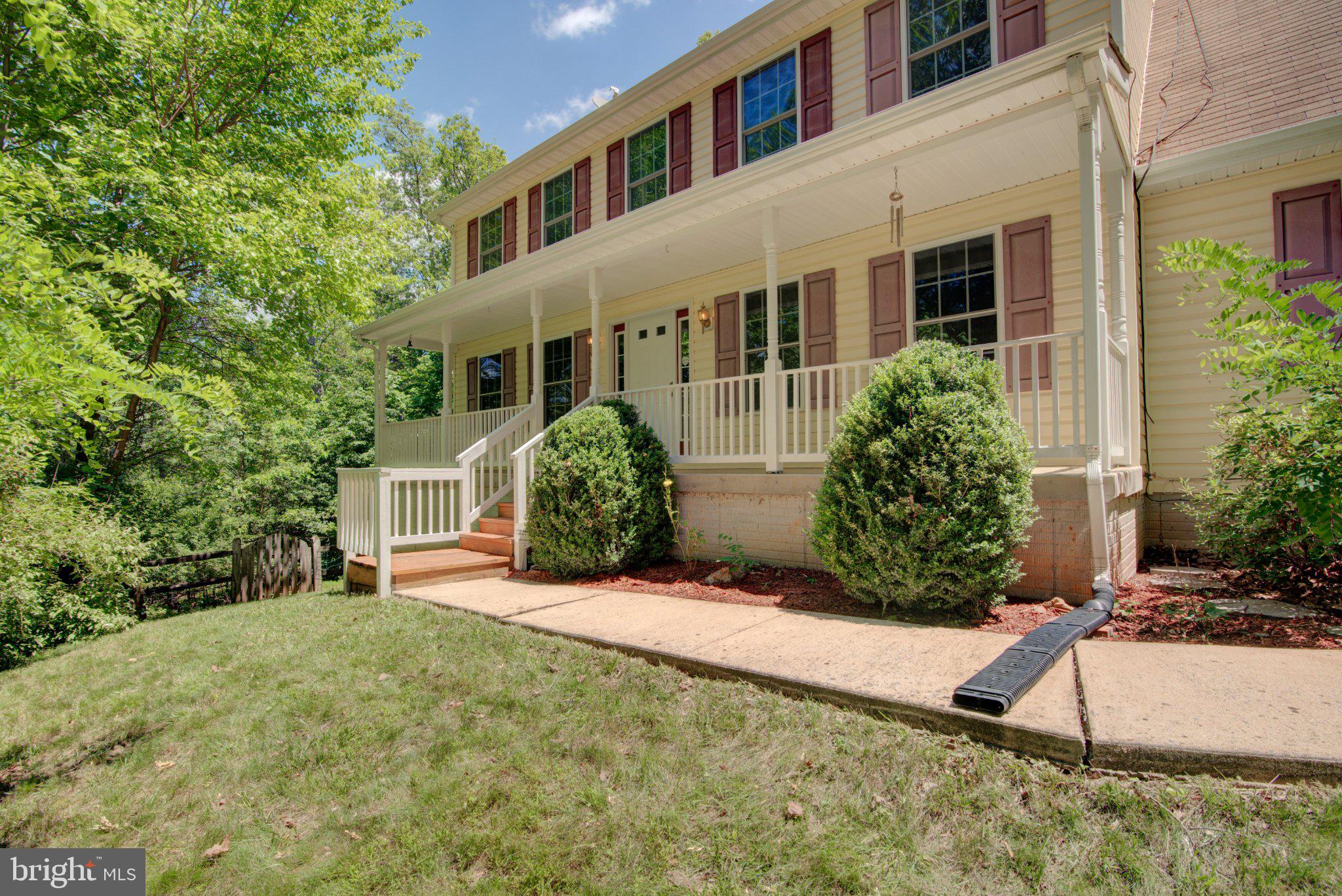 Tucked away on 5 private, wooded acres in the peaceful countryside of Hedgesville, this charming 3-level Colonial offers the perfect blend of comfort, space, and natural beauty. Surrounded by mature trees, the setting provides a true sense of seclusion and tranquility while still being within convenient reach of everyday amenities.

Inside, you'll find a thoughtfully designed floor plan featuring 4 spacious bedrooms and 2.5 baths. Freshly painted throughout, the home is move-in ready and filled with inviting spaces for both everyday living and entertaining. The heart of the home is the open-concept kitchen, which flows seamlessly into the breakfast area and family room, creating an ideal gathering space for family and friends. A cozy fireplace anchors the living room, adding warmth and character during cooler months.

The wooded acreage offers a picturesque backdrop in every season, requiring minimal yard maintenance so you can spend more time enjoying the serenity of your surroundings. Whether you're sipping your morning coffee while listening to the sounds of nature or unwinding after a long day in this quiet setting, you'll appreciate the privacy and peaceful lifestyle this property provides.

If you've been searching for a home that combines classic Colonial charm with the beauty of West Virginia's countryside, this is an opportunity you won't want to miss.