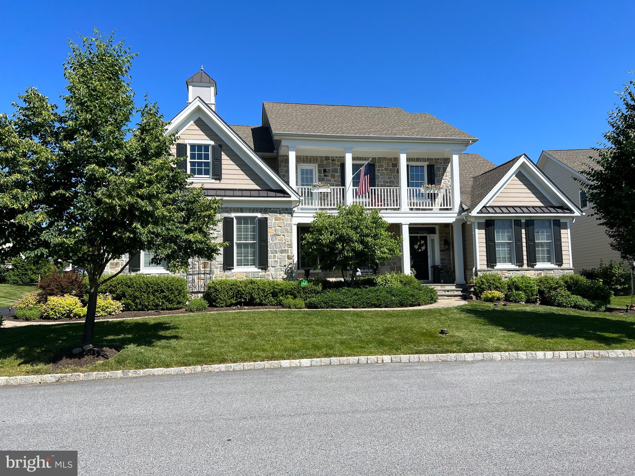 If you have been wanting to live in Liseter but not quite ready to give up your beautiful big home, now you can have it all.  Welcome to this single family home in a bucolic location with wonderful surroundings and a glorious view of the magnificent Liseter pond.  Enter the house from the winding paver walkway onto the lovely flagstone front porch and enter into the inviting two-story Entrance Hall. You will first see the formal Living Room and the formal Dining Room, both full of tasteful decorator enhancements. Proceed further into the grand two-story Family Room with a gas fireplace and room for everyone to relax and enjoy. Today's open concept idea is here for your enjoyment as you look from here into the informal Dining Area and the beautiful island Kitchen with white cabinetry, black granite countertops ands stainless steel appliances. Adjacent to this you will see the  enticing screened porch where the living is easy and entertaining is a joy. A door from the porch leads down to the patio, surrounded by lovely plantings and young trees. Tucked away on this floor, you can enter the spacious  FIRST FLOOR Primary Bedroom Suite with vaulted ceiling,  and a wall of windows with awesome views of the patio and lush open space. The Primary Bath is all that you would expect and more including an enclosed commode with window, tub and separate shower with frameless shower doors and double bowl, granite topped vanity. The dramatic curved staircase to the second floor unveils more wonderful space  with a balcony overlooking the family room and kitchen, a large Bonus Room that can be an office, playroom or even a spare bedroom if needed. There is an en suite Bedroom with Bath as well as Jack & Jill Bedrooms that share a lovely Bath. The big surprise is found in the second bedroom that features a door to a charming front balcony where you can enjoy coffee in the morning or a glass of your favorite beverage in the evening,  all while enjoying the gorgeous open space with no other houses between you and the idyllic view. No need to drive to the pool, gym, tennis courts or just to get your mail, as it's just a quick stroll to everything that Liseter has to offer for your year-round enjoyment.