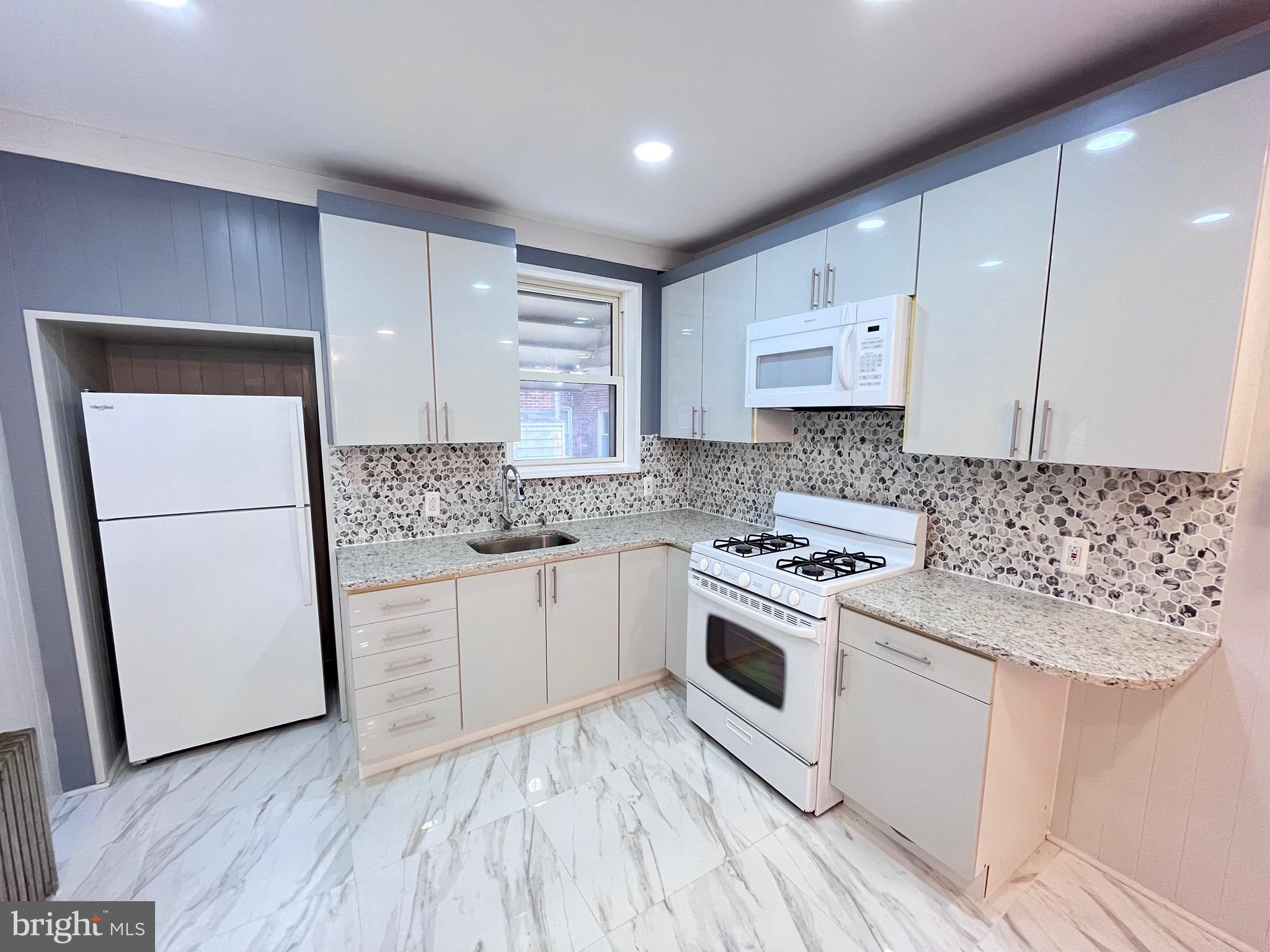 New Price! Welcome to this traditional brick Row/Townhome, located in the Olney neighborhood of Philadelphia, a neighborhood known for its strong transportation access, medical and educational institutions, and convenient city living. This home offers a practical layout and comfortable living spaces, making it a great opportunity for both owner-occupants and investors alike. Begin with the front lawn & cement patio, offering a relaxing respite to enjoy your beverage of choice while you sit outside and enjoy the weather. Step inside and the warmth from the radiator heat will take away the outside chill. This home mixes modern recessed lighting with classic wood paneling charm in this straight thru, Living room, Dining room, and newly renovated, granite, Kitchen, with rear balcony access. The lower level offers plenty of storage space, gas utilities, laundry facilities, inside access to a former garage space that has been converted, and offers the potential for the next owner to finish into substantially more living space; and you still have a rear driveway parking spot. The upper level accommodates with three spacious Bedrooms, each freshly painted and carpeted, and a hallway 4pc Bathroom, including a skylight. The surrounding area provides easy access to daily necessities, public transportation, and neighborhood amenities that continue to support long-term demand. Residents enjoy proximity to several popular local points of interest, including:
Olney Transportation Center, one of SEPTA’s major transit hubs, offering access to the Broad Street Line and multiple bus routes throughout the city.
Einstein Medical Center Philadelphia, a major healthcare and employment center serving the region.
La Salle University, located nearby, contributing to the area’s educational presence and neighborhood activity.
This home has so much to offer! Please take a minute to view the Video Tour and schedule your in-person showing appointment, today! Some photos have been virtually staged/enhanced.