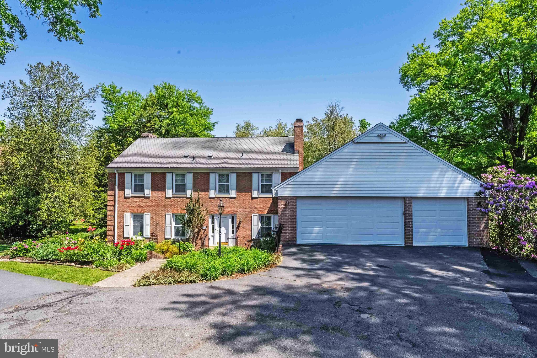 Nestled in the prestigious Cloisters of McLean, this 5-bedroom Colonial offers a rare opportunity to own a home on a 1.13 acre lot that feels like botanical gardens.  Surrounded by $3M+ luxury homes, this home is excellently maintained and in a prime location.  This home is being sold AS-IS.

This home is assigned to the highly sought after school pyramid of Churchill Road Elementary, Cooper Middle and Langley High, all located in very close proximity.  Location, location, location! Minutes to downtown McLean, Tyson's Corner and both Metro Stations.  A Commuter's Dream: close in location to downtown DC and all major arteries and highways to easily access the DMV.  Minutes to both Dulles and National Airport.  
Over 3,300 sq. ft. on a massive cul-de-sac lot backing to serene, wooded parkland.
Flexible Layout: 5 bedrooms and 3.5 baths, including a convenient main-level bed and bath.
Indoor-Outdoor Flow: Gorgeous views from every room. The kitchen, dining, and family room areas feature glass doors opening to expansive patios, decks, and lush gardens and vistas. The family room features almost 12 feet ceilings and has a  fireplace with a marble surround and a cherrywood mantle. It also boasts an expansive cherrywood built-in wall unit for massive storage  and is designed to hold a large TV with multiple sound components.
The bright airy eat-in kitchen leads to a formal banquet size dining room with large glass doors that lead to a stunning flagstone patio.   All kitchen appliances are stainless steel Bosch including a convection cooktop with a popup vent, double ovens and armoire style refrigerator.  Cooktop and double ovens are about 5 years old. 
To continue with the flow of entertainment, step into a large formal living room with10 foot high ceilings.  The living room has a wall of tall windows overlooking the exquisite grounds, bringing the outdoors in.
4 large airy bright bedrooms upstairs, each with stunning views and closets galore.  The primary suite is spacious with a big dressing room and large ensuite bathroom.  In addition to all the natural light, there is plenty of recess and overhead lighting as well. Chandeliers do not convey.

Don't forget about the 3-car garage with tons of extra storage. 

Please note that a piece of the 1.13-acre lot sits in the floodplain; the house itself is not in the floodplain and the current owner pays no flood insurance. (Please refer to the PLAT in documents).