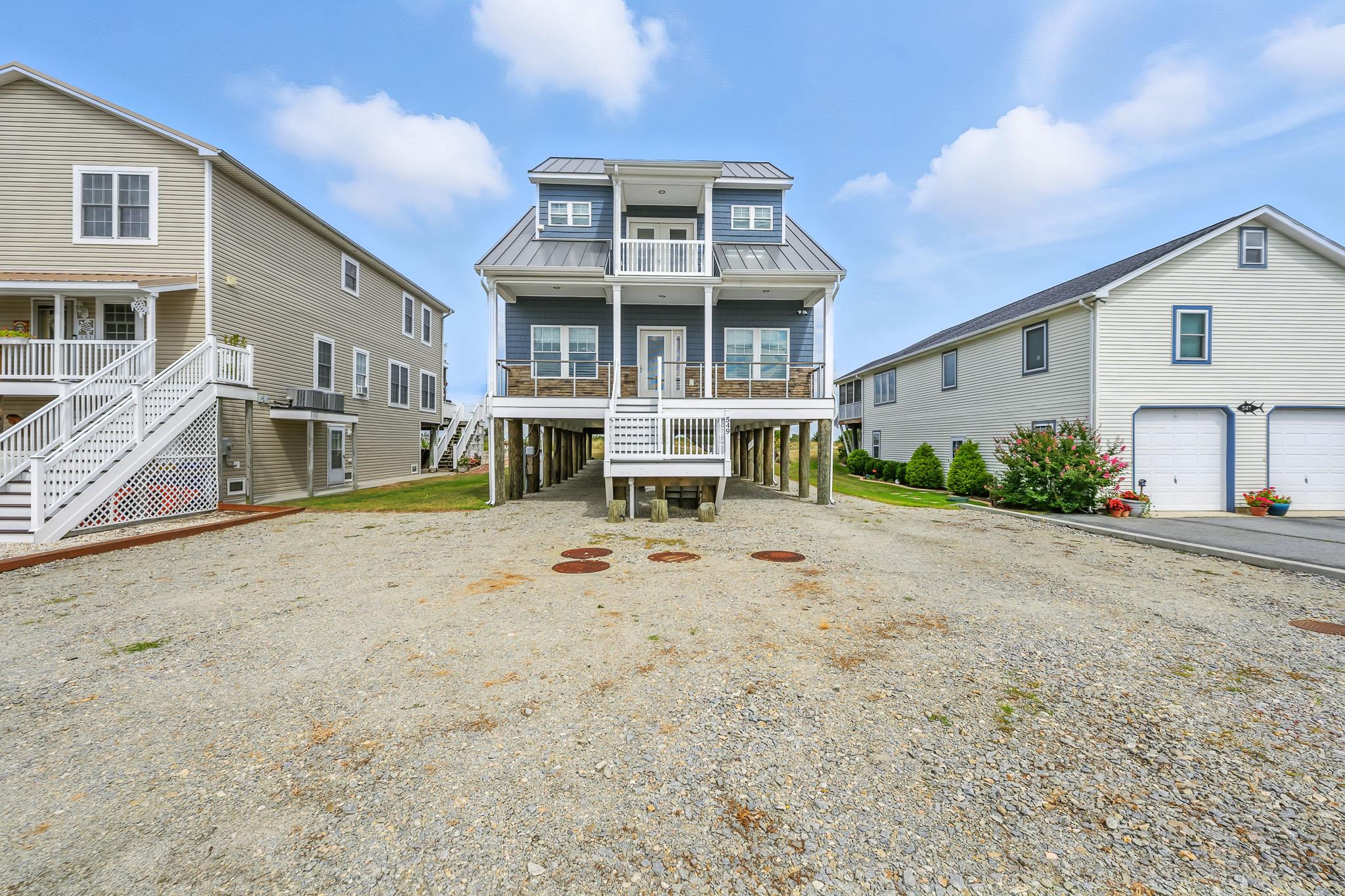 Welcome to coastal living at its finest in this stunning 3,000 sq. ft. bayfront home tucked away from the crowds on a quiet Delaware beach. Perfectly positioned to capture breathtaking water views and unforgettable sunsets, this beautifully maintained property is like-new, completed just two years ago with added attention to detail by the Builder/Owner.  

Step inside to an open and airy floor plan filled with natural light, featuring soft coastal tones, durable flooring, and thoughtfully designed living spaces. The main living area flows seamlessly into the kitchen and dining spaces, creating the perfect setting for entertaining or relaxing after a day on the water.

With four spacious bedrooms and flexible living areas, there is plenty of room for family and guests. The second-floor loft provides additional space for a sitting area, office, or overflow sleeping. There is an attached apartment space, equipped with its on kitchenette, full bath and bedroom that provides rental income potential or can be a great in-law suite.

Enjoy the outdoors from your private deck overlooking the bay, where you can take in panoramic views, watch wildlife, and experience the peaceful beauty that Slaughter Beach is known for!

Whether you're looking for a full-time residence, vacation home, or investment opportunity, this property offers a rare chance to own a slice of Delaware’s coastline.