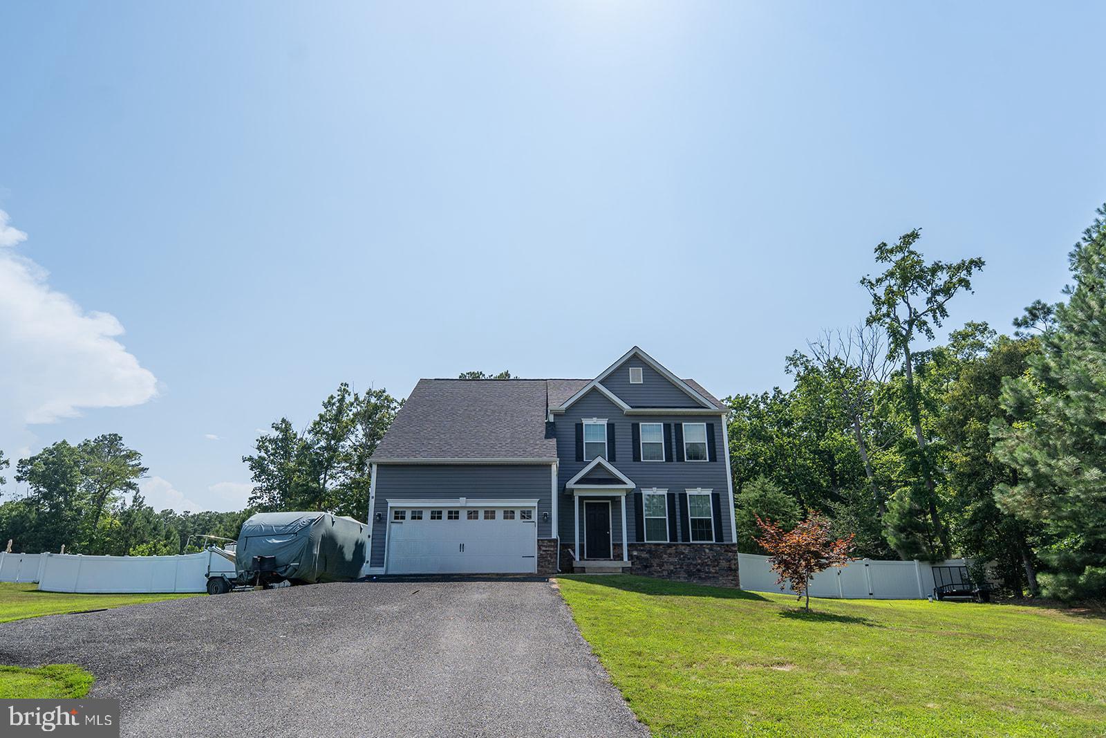 Classic colonial in desirable The Crossing at Riverside Farms neighborhood.  Feel like you're in the country on this 1+ acre lot but only minutes to shopping, schools, parks and Pax River Base.  Nice open floor plan features a generous open floor plan with spacious kitchen that has ample cabinet and counter space, walk-in pantry, large island and sun room overlooking the fenced backyard.   All flow right into a breakfast space and family room.  There is a separate living/dining/office space also.  The primary suite offers a place of sanctuary with it's luxurious bath and plenty of closet space.  Three additional bedrooms, full bath and laundry room round off the 2nd floor.  The basement has been recently finished to include a rec room, office, exercise space and full bath.  Enjoy the fenced backyard and private above ground pool.  2 Car garage features a Ford EV Charger.  Beautiful community with plenty of community space the kids to enjoy kicking a ball around or indulge in the water access which is just a beautiful bonus!