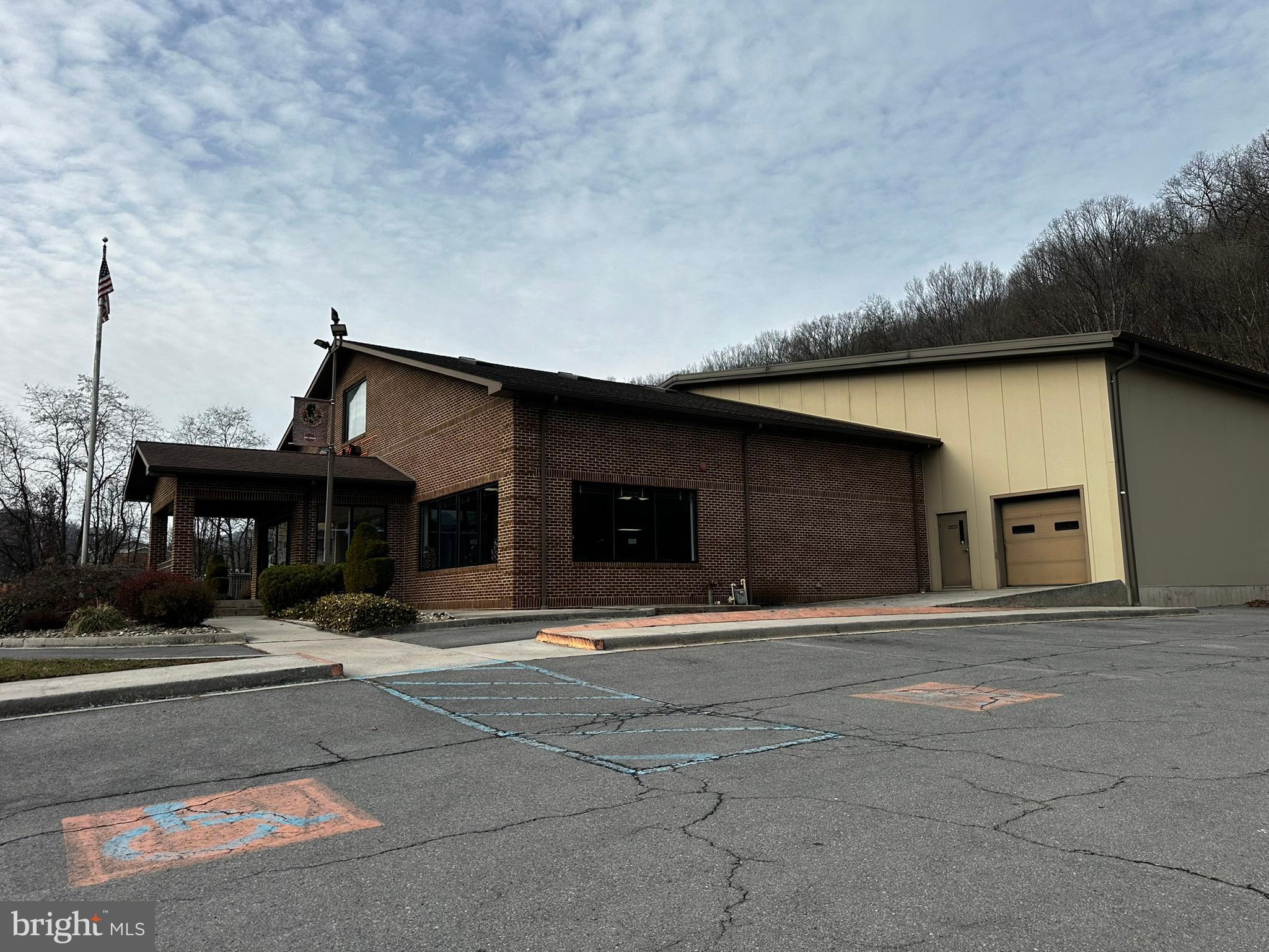 Back to Active 3/25/2026 - Built "New"  in 2001 on top of old Roy Rogers Foundation + Huge Metal Building - 6 zones heat and A/C all ADA improvements (per codes in 2001) Very well built and maintained. Large lot with 40+ parking spaces and "drive through" shop. Large storage and meeting rooms upstairs plus basement storage.

12,168 main level = 74 x 44 (brick) showroom/offices/restrooms, etc. 88 x 100 metal at rear + portico
4,432 SF upper level Storage/Meeting room/offices
Approx 3,000 sf basement for storage