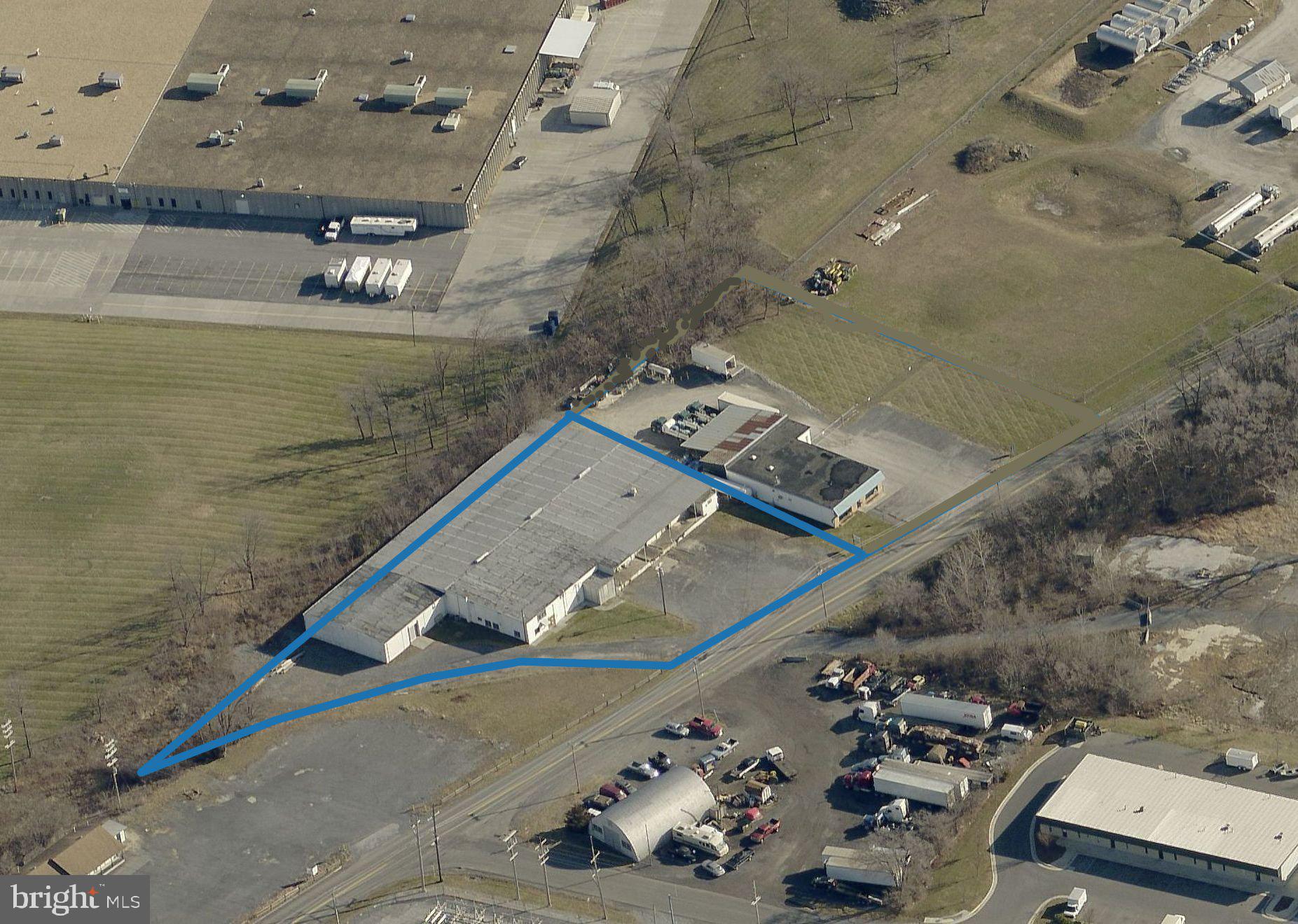Offered for sale at $2,200,000, 205 Brick Kiln Road in Winchester, VA is an industrial property containing 28,160 square feet per the Frederick County Assessor, situated on 1.2 acres with rare M2 zoning near the Winchester City/Frederick County line. The building is configured into three suites, with approximately 24,300 square feet reflected across the current rent roll and CAM budget, and includes 11,600± square feet available for lease. The available space features an efficient industrial/flex layout with approximately 1,800± square feet of office/mezzanine and 9,800± square feet of warehouse space, along with loading, 3 phase power, and on site parking. Warehouse clear heights measure approximately 18' to the roof deck, 16'8" to the underside of the primary steel roof beam, and approximately 15'11" at the eave, making the space well suited for contractor, service, light production, or distribution users. The property presents a compelling opportunity for an owner user or investor seeking in place income with near term lease up potential. Showings are by appointment only—contact the listing agent for additional information.