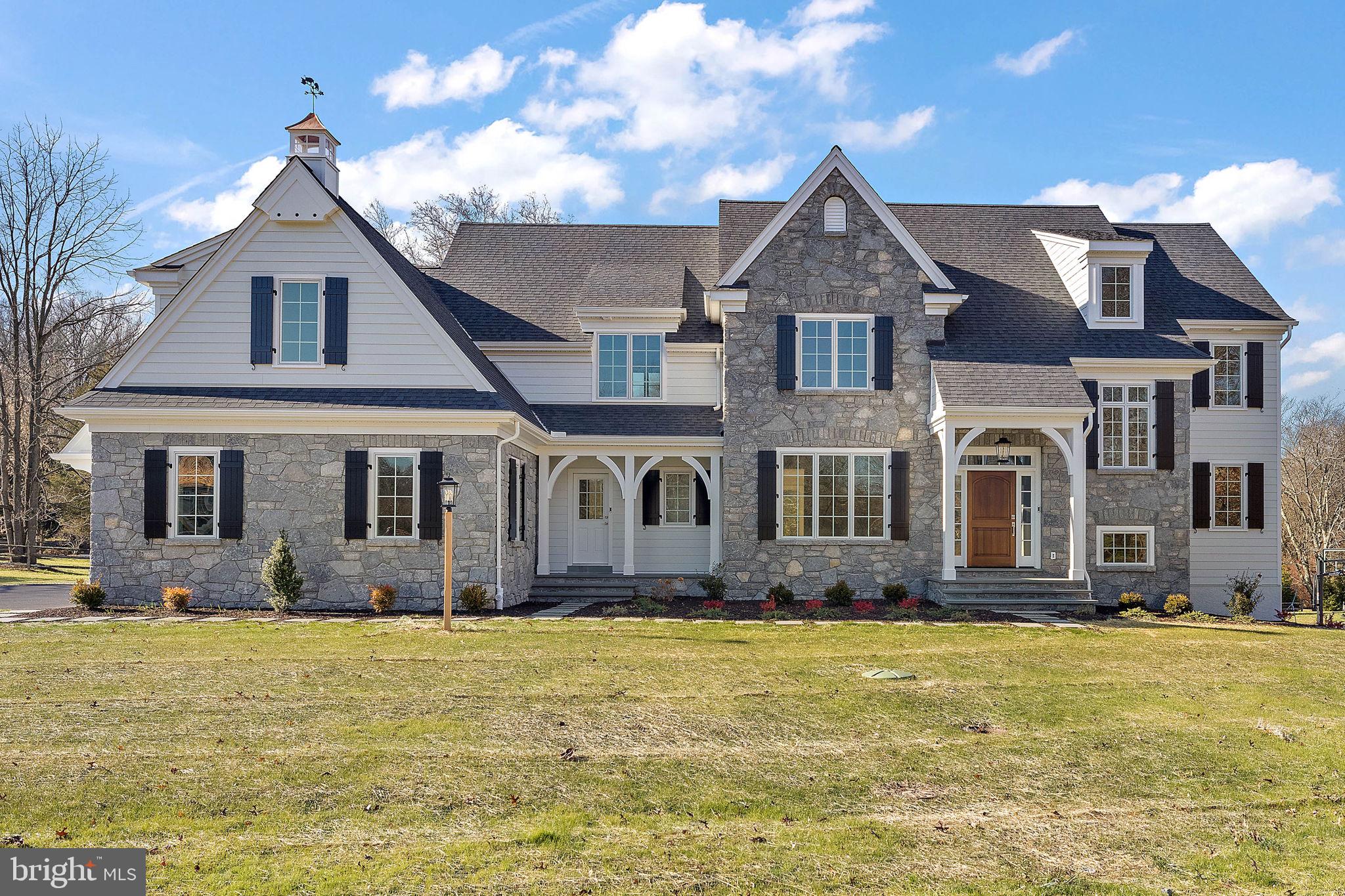 Now offering one of the most impressive custom home opportunities in Malvern, The Estates at Howell Ridge presents a rare chance to build on a private 4-acre homesite set high on a scenic ridge with sweeping valley views. This exceptional setting offers the perfect blend of privacy, luxury, and convenience just minutes from Route 202, the Pennsylvania Turnpike, Great Valley Corporate Center, shopping, dining, and award-winning Great Valley schools.
Unlike traditional production construction, Estates at Howell Ridge offers a true custom building experience. Buyers will work directly with Hellings Builders and their architect to personalize the home to their lifestyle, vision, and design preferences. From floor plan modifications to curated finishes and architectural details, each residence is crafted as a one-of-one home tailored specifically to the buyer.
The featured Newtown Model combines timeless architecture with a fresh, open design created for modern living. The expansive kitchen, breakfast area, and family room create a seamless gathering space filled with natural light, while a large private study offers flexibility for a home office, library, or quiet retreat. A formal dining room, spacious mudroom, and thoughtfully designed layout make the home equally functional and elegant.
The second floor is anchored by a luxurious owner’s suite featuring a tray ceiling, oversized walk-in closets, dressing area, and spa-inspired bath. Secondary bedrooms are generously sized with well-designed en-suite and Jack-and-Jill configurations.
Built by Hellings Builders, known throughout Chester County for exceptional craftsmanship, enduring quality, and attention to detail.
NOTE: THE PHOTOS SHOWN ARE OF A COMPLETED HOME AT A DIFFERENT LOCATION AND MAY INCLUDE OPTIONS, UPGRADES, AND ALTERATIONS NOT INCLUDED IN THE BASE PRICE. PLEASE CONTACT LISTING AGENT FOR DETAILS.