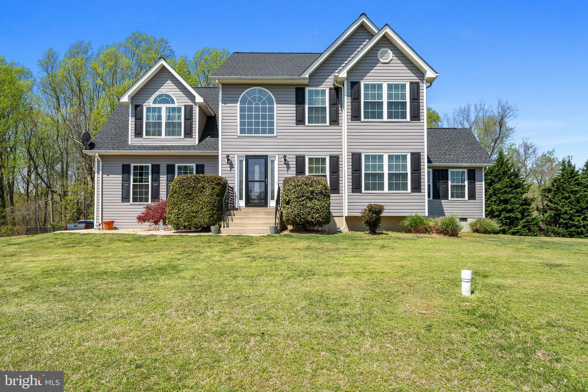 This well-loved and charming house, rebuilt in 2003, is move-in ready! Owners are taking away your worries and have made so many improvements so you can move right in! But before I tell you about that, if you're a person who takes to the road in your travel trailer or RV, there are TWO RV pads waiting for you on this lot! And one of them has 50-amp service and a line to empty your waste directly into your backyard septic system! Talk about creative and convenient! Whether you're storing your travel vehicles or others are visiting you in theirs, you'll have it all ready to go for them, too! 

As for the home improvements, you'll be waking up each morning with a new roof over your head that was installed in 2022; 2023 - new propane Gas Heat & Glo fireplace and new siding; 2024 - upstairs HVAC and stainless Kitchen-Aid appliances; 2025 - kitchen vinyl flooring, new windows and living room carpet! Primary bedroom with en-suite bathroom boasts a cozy little reading nook and your washer/dryer just steps away on the top floor. All bedrooms are carpeted and have ceiling fans and are neutral in color. The living room has a gorgeous accent wall that ties into the tile work from the kitchen and breakfast nook. You'll have nothing but warm and cozy vibes from the moment you walk into the front door and settle into the living room. The unfinished basement is built from the original house foundation and approved/permitted in 2003 for the rebuild. The basement has a framed-in 5th bedroom that has a closet and a nice basement window next to the walkout backdoor. The 2-car garage insulated on the walls and the garage doors and there's plenty of turn-around space in this driveway!

Plum Point Elementary and Middle Schools are a stone's throw away and if you want the beach life, Breezy Point beach, North Beach and Chesapeake Beach communities/beaches are just 10 minutes away! Enjoy the sand, boardwalk, quaint beach shopping or an ice cream amid nature areas...convenient to recreation centers, libraries and within commuting distance to Pax River, Andrews AFB, Bolling AFB, DC and so many other areas!