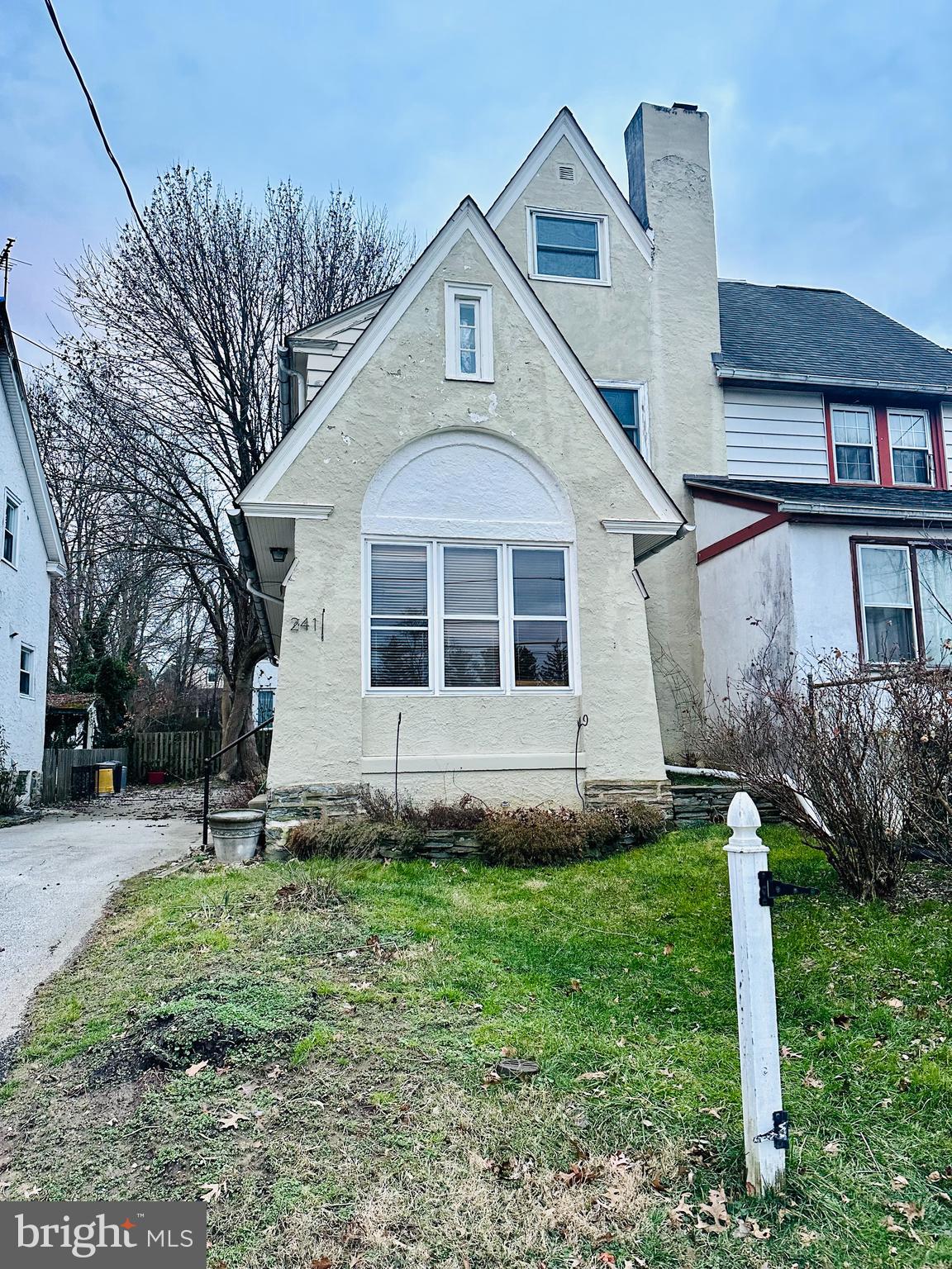 Welcome to 241 Rockingham Rd. in the sought-after neighborhood of Bryn Mawr, PA! This exceptional property offers a wonderful blend of style, comfort, and convenience. Upon entering, you are greeted by a bright and spacious, enclosed All-Season Heated Porch with a Ceiling Fan. Then that leads into a stunning open-concept living area.  The main level features hardwood flooring and large windows that allow natural light to flood the space, creating a warm and inviting atmosphere. The adjacent dining room provides the ideal space for formal meals or intimate gatherings.  There's a door to the backyard off of the kitchen that will entertain a whole family and friends, especially in the warm seasons. The upper level of the home offers 3 bedrooms and a full bathroom.  Don't forget to check out the balcony off of the master bedroom.  There's an additional floor above and it offers another bedroom and the full bathroom. Step outside to discover a privately fenced backyard oasis.  Ample space for tables and a large umbrella to have a party! Located in a highly desirable, top-rated Radnor SD., and it's right in front of the Clem Macrone Park; Gas heat; Close To Shopping, Libraries, Parks, Route 100 Trolley & R-5 Train!