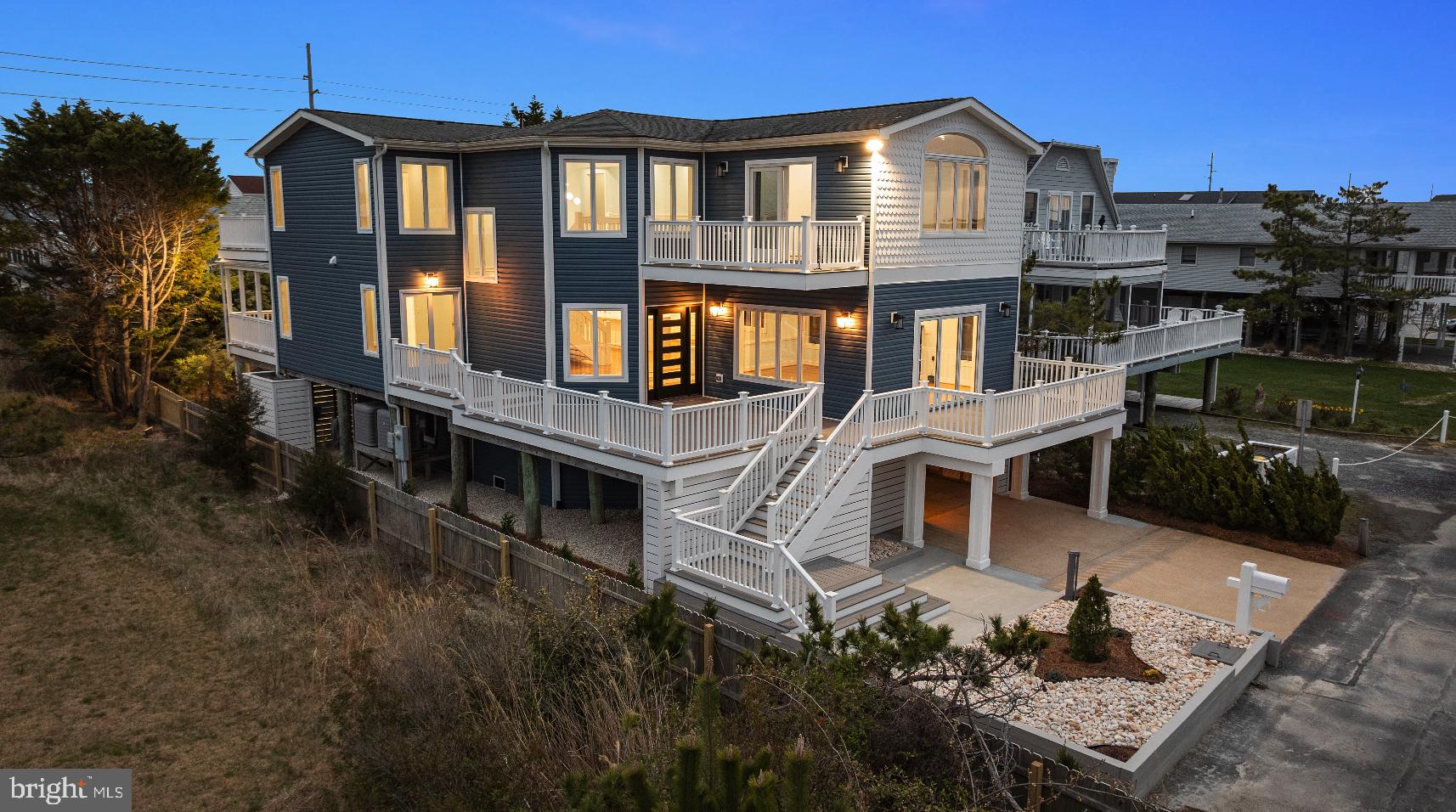 Welcome to this stunning, fully renovated 5-bedroom, 3 bathroom bayfront home in Fenwick Island, DE. Offering an unparalleled living experience, this exquisite property boasts sweeping panoramic views of the serene bay, ensuring breathtaking vistas from almost every room.
Step inside to discover a beautifully reimagined interior that blends luxury with modern design. The heart of the home is the state-of-the-art kitchen, featuring top-of-the-line appliances, custom cabinetry, and gleaming countertops (quartz). Whether you’re entertaining guests or enjoying a quiet meal, this culinary haven provides the perfect setting.
The spacious, light-filled living areas are perfect for both relaxation and entertaining, with large windows that flood the home with natural light and frame the spectacular water views. Each of the five generously sized bedrooms offers comfort and style, while the four meticulously designed bathrooms provide spa-like retreats with high-end finishes and fixtures.
Outside, the property is equally impressive, with expansive decks and outdoor living spaces perfect for enjoying the peaceful bayfront setting. This home is a true sanctuary, offering the ultimate in coastal living with easy access to local beaches, dining, and entertainment.
This is more than just a home; it’s a lifestyle. Don’t miss the opportunity to own a piece of paradise in Fenwick Island