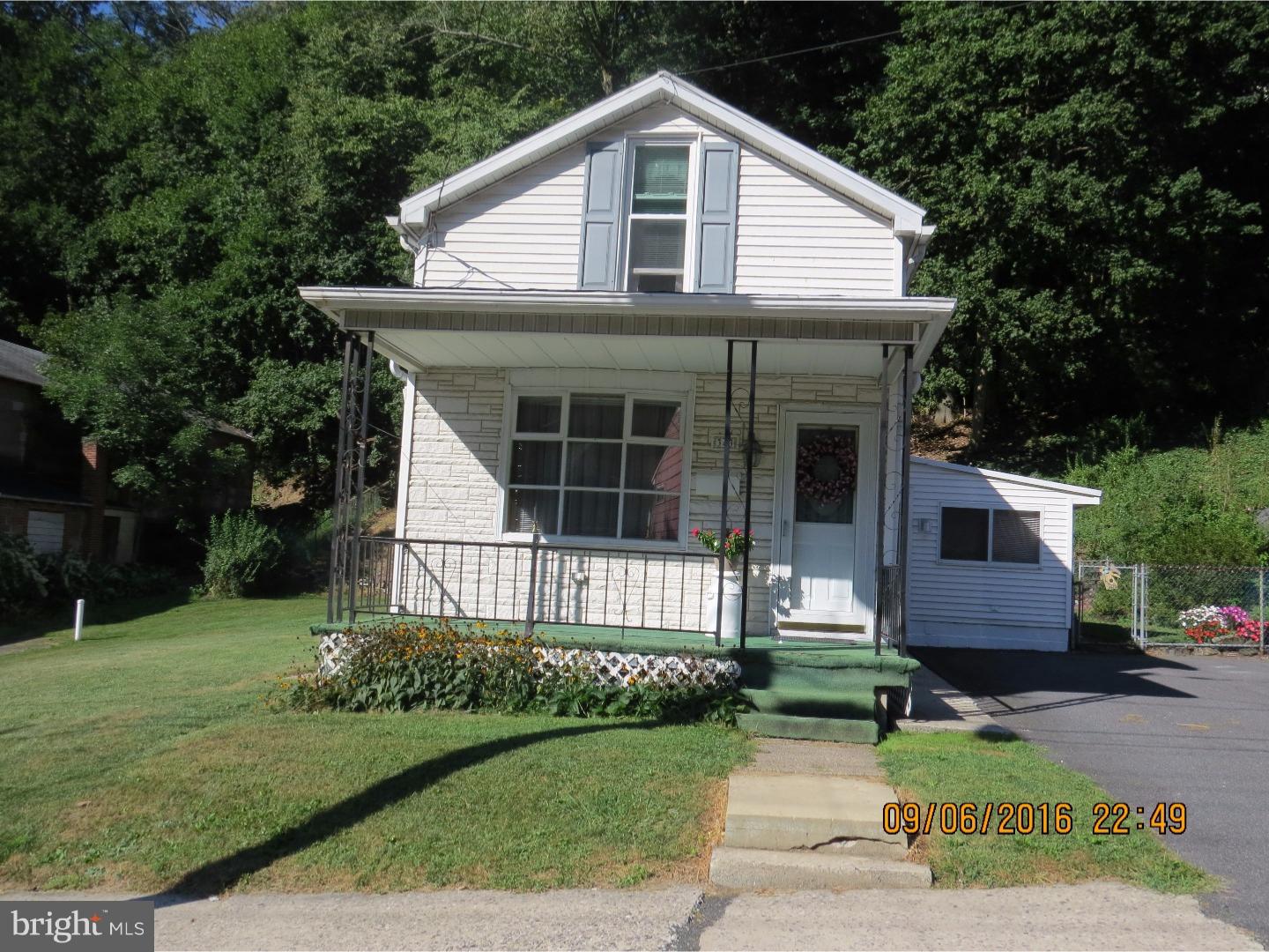 Charming Pottsville home with double lot! lot parcel# 68-22-0193. Adorable back yard nicely landscaped and sunroom off kitchen! Replacement windows, new roof in 1998 and furnace 2006.  Within walking distance to Pottsville Hospital easy access to all major routes.