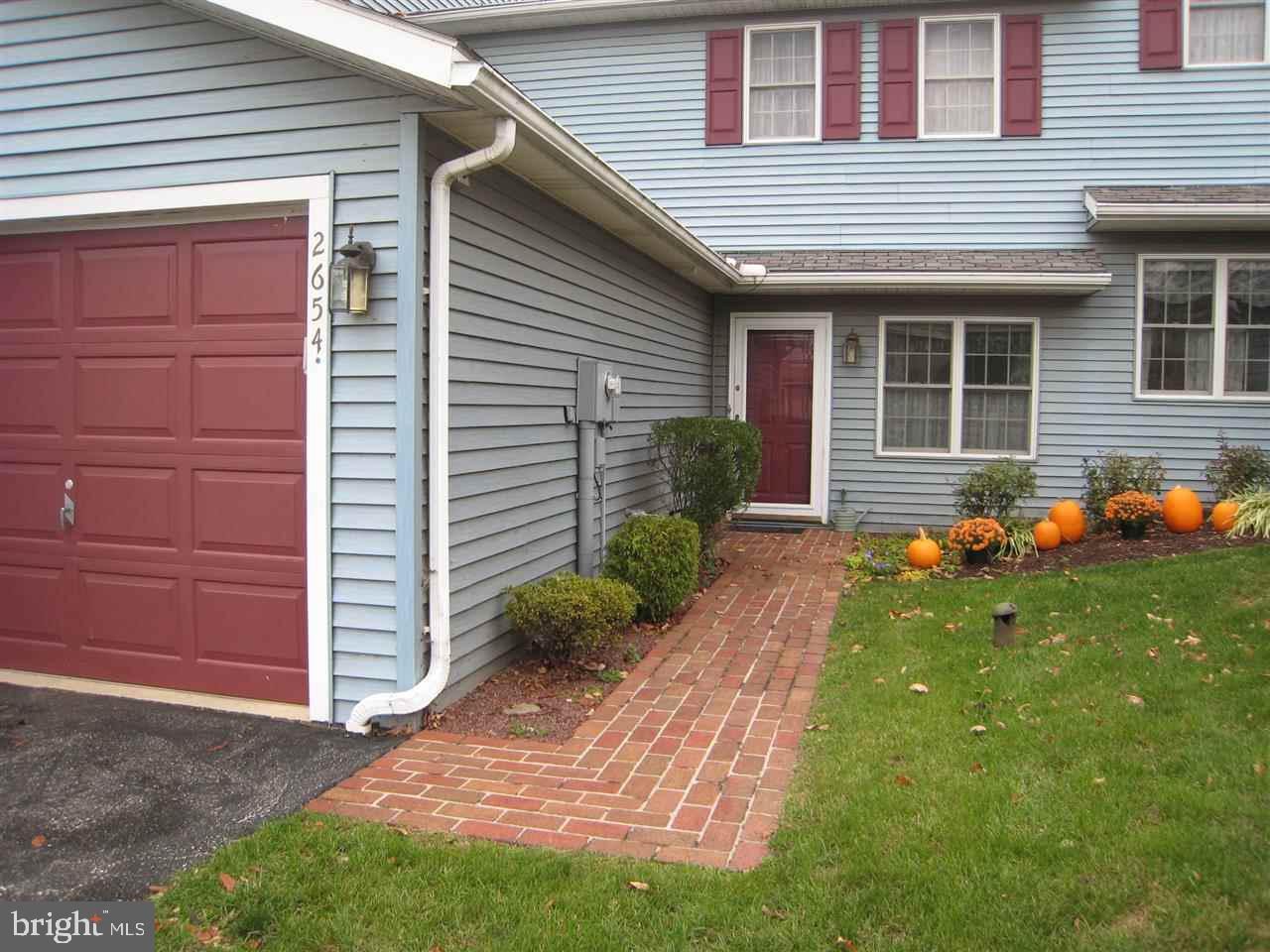 Lovely condo offering first floor and 2nd floor master bedroom and bath   Surrounded by private walking trail and backs to golf course   Large dining/living area features gas fireplace and opens to private deck   New flooring in kitchen and foyer   Walk-out basement waiting to be finished.