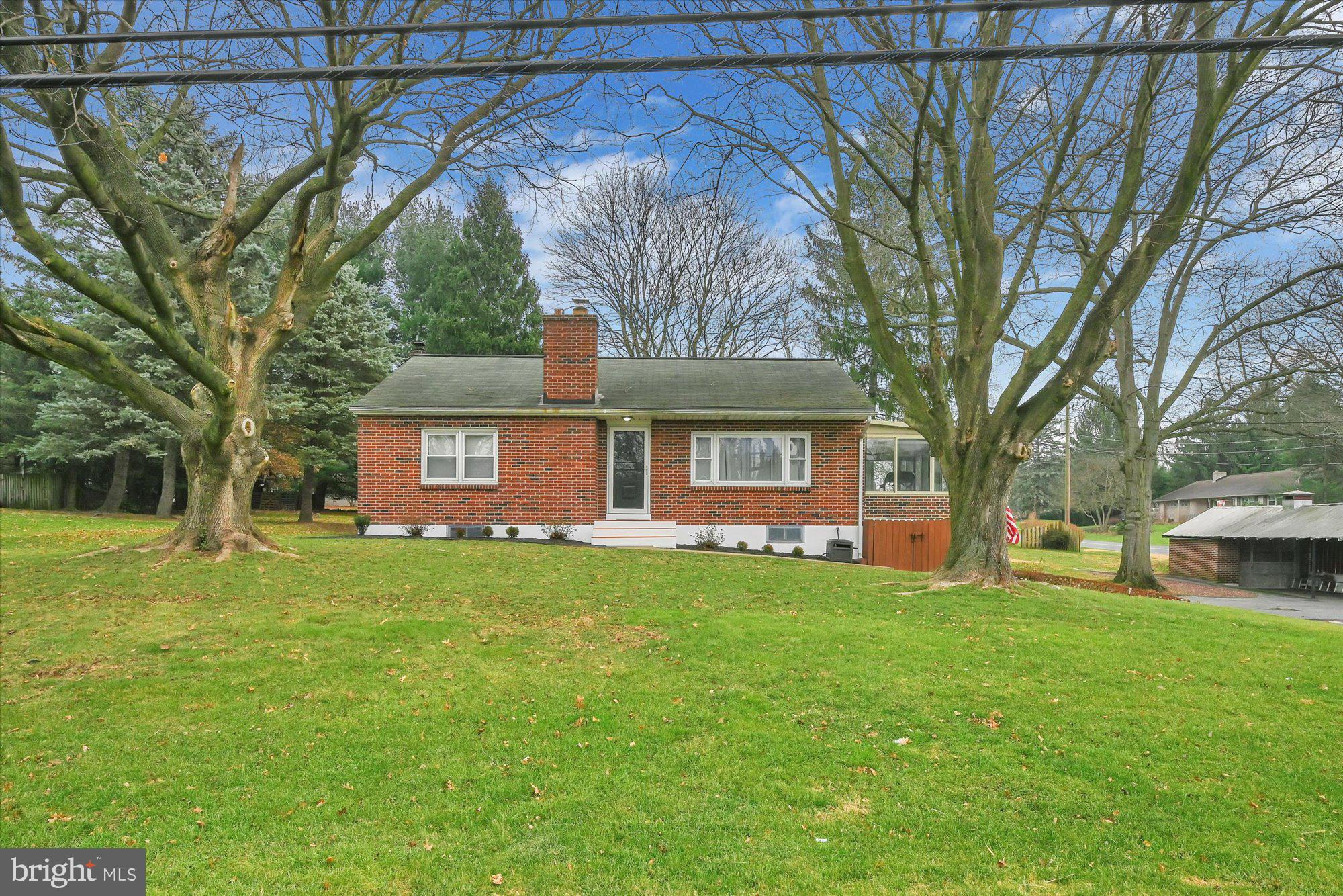 Beautifully maintained brick Rancher in Northern Lititz. 2 bedrooms and full bath on main floor. Basement features a wood burning fireplace, a bar that can stay or be removed, and hookups for washer/dryer. Large backyard,  2 car garage plus carport, sunroom and deck. Great location just minutes from all the action in downtown Lititz.