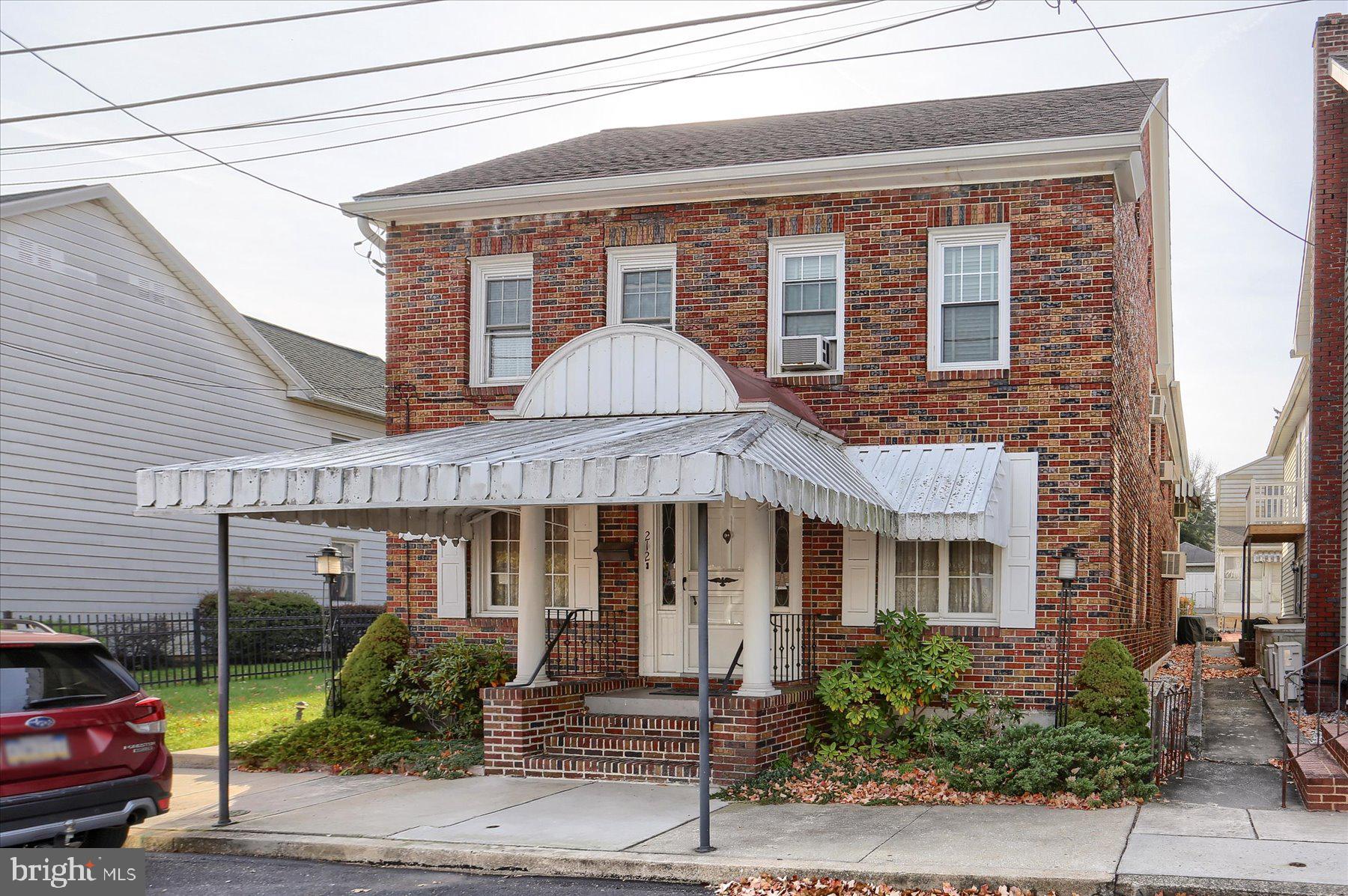 Huge solid brick 2-story building with attractive rear deck and 3 bay detached garage!!! Formally used as a 1st floor commercial space with apartment above, this spacious building features a total of over 3000 square feet. Upstairs you'll find 3 bedrooms, full bathroom, dining room and kitchen with walk-out access to a renovated covered porch. The first floor is an open canvas ready for your design. Currently, the space features an abundance of open space, half bathroom and 3 additional rooms to the rear of the building. Last but not least don't forget the oversized 3 bay garage with ally access! Please contact Marysville Borough for details on permitted uses for this property. As per a Marysville Borough representative, this property no longer qualifies for commercial use.